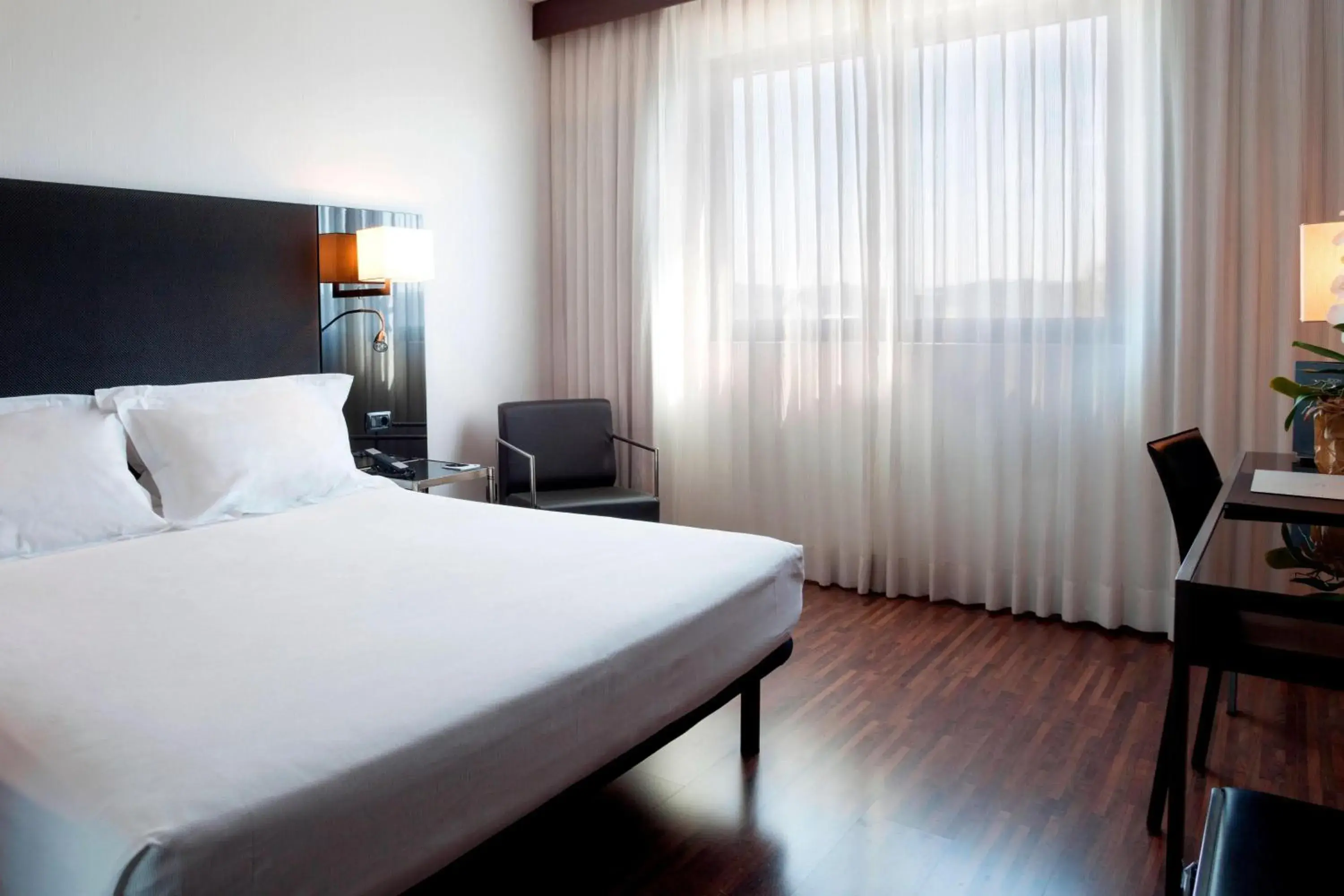 Photo of the whole room, Bed in AC Hotel Padova by Marriott