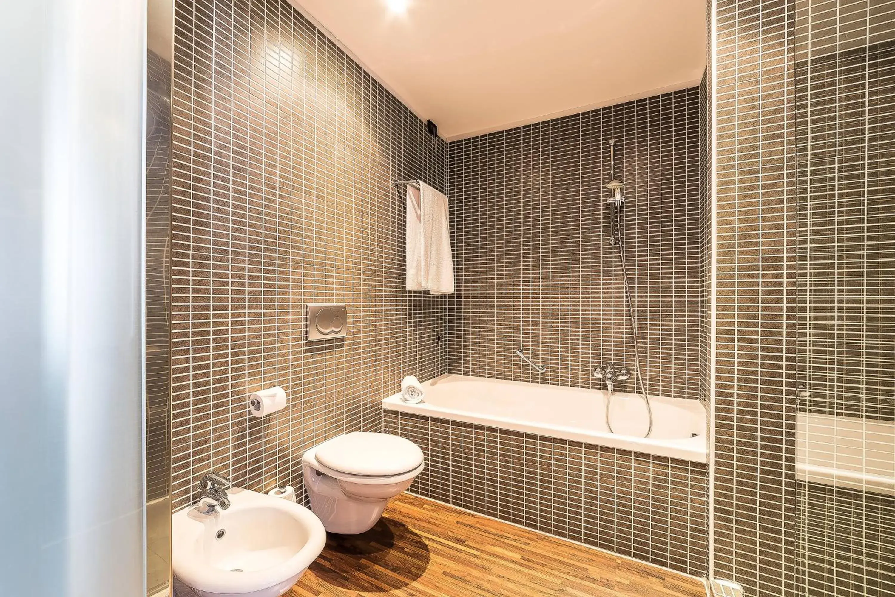 Bathroom in AC Hotel Padova by Marriott