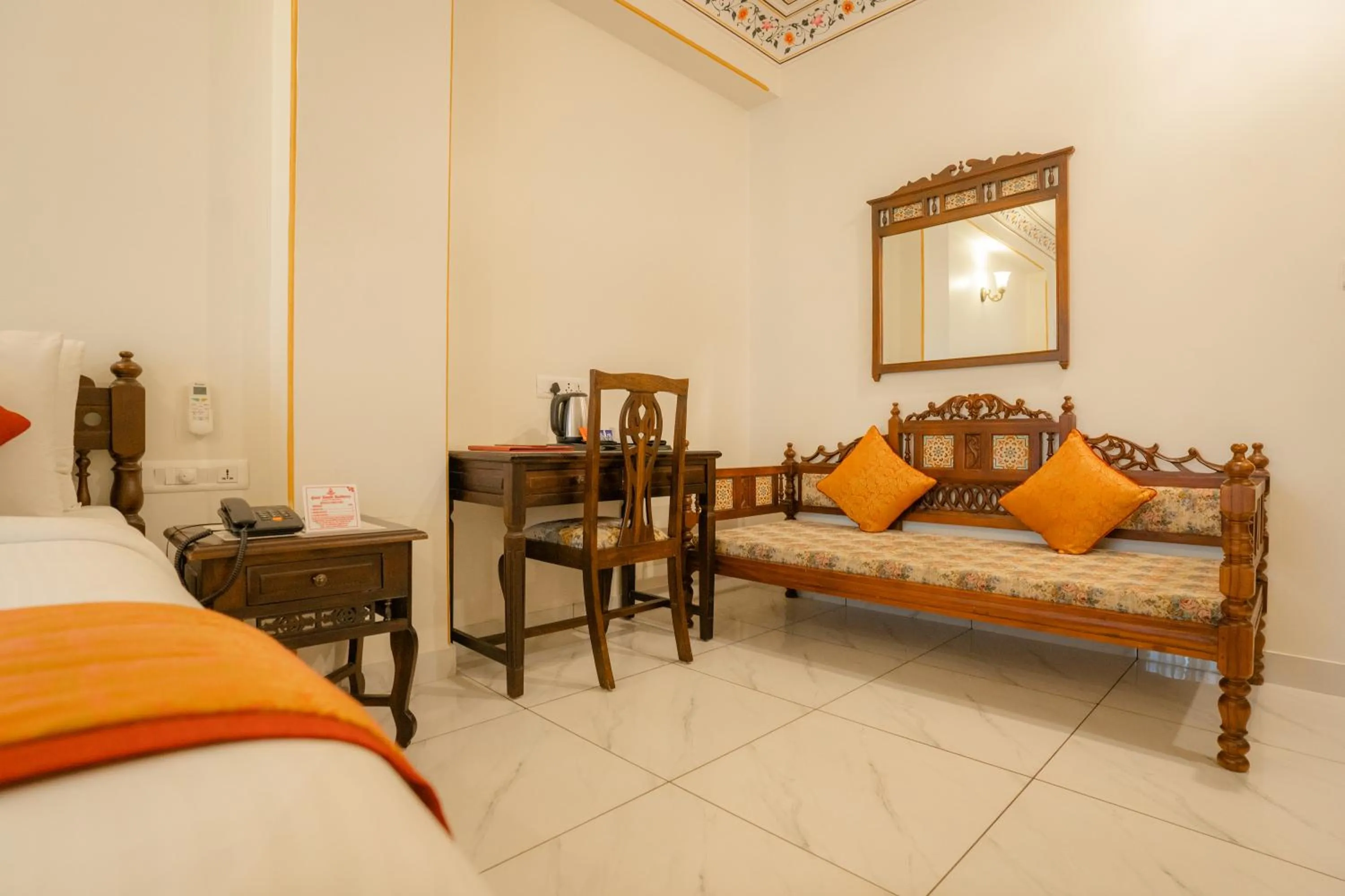 Seating area, Bed in Umaid Residency - A Regal Heritage Home