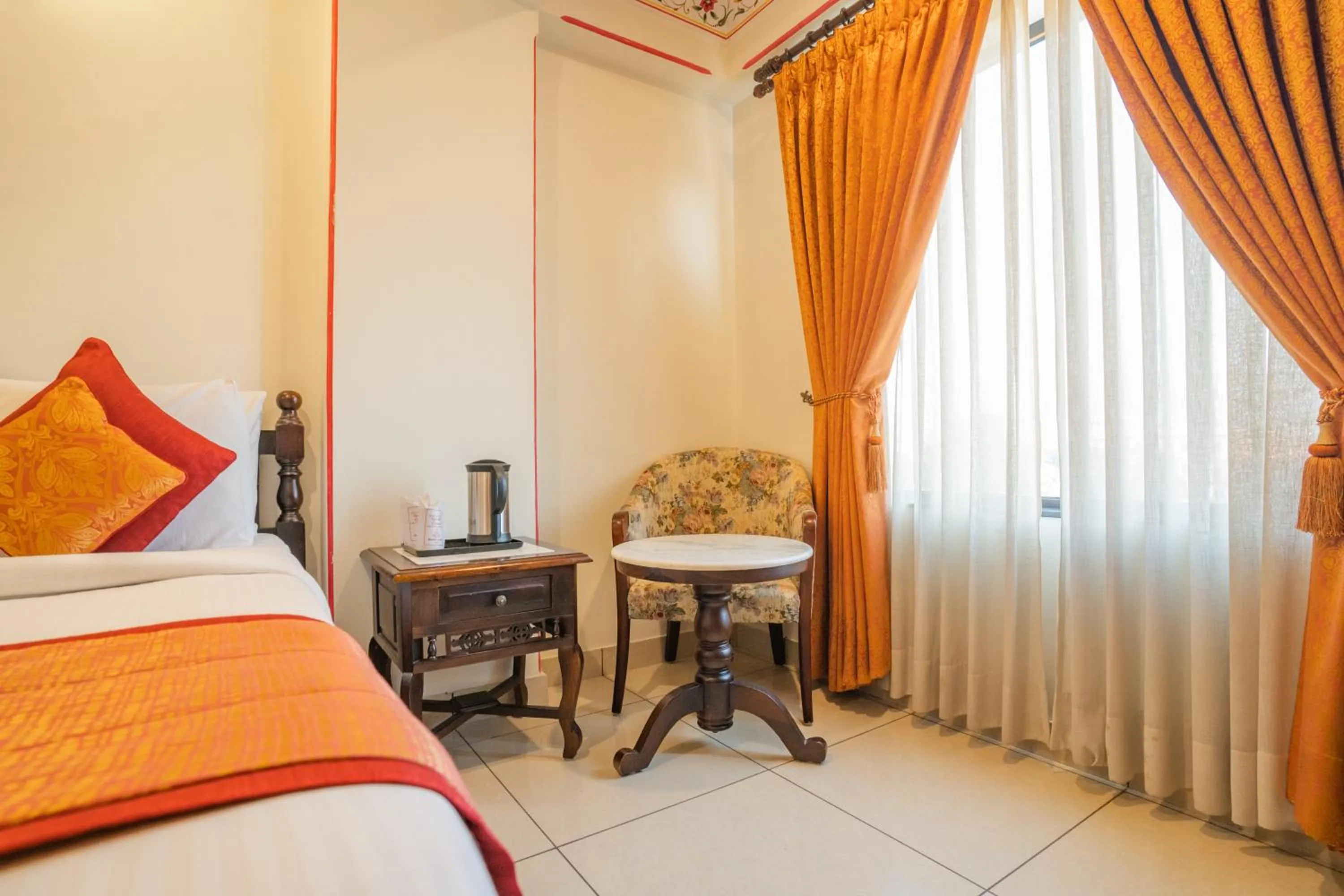 Seating area, Bed in Umaid Residency - A Regal Heritage Home