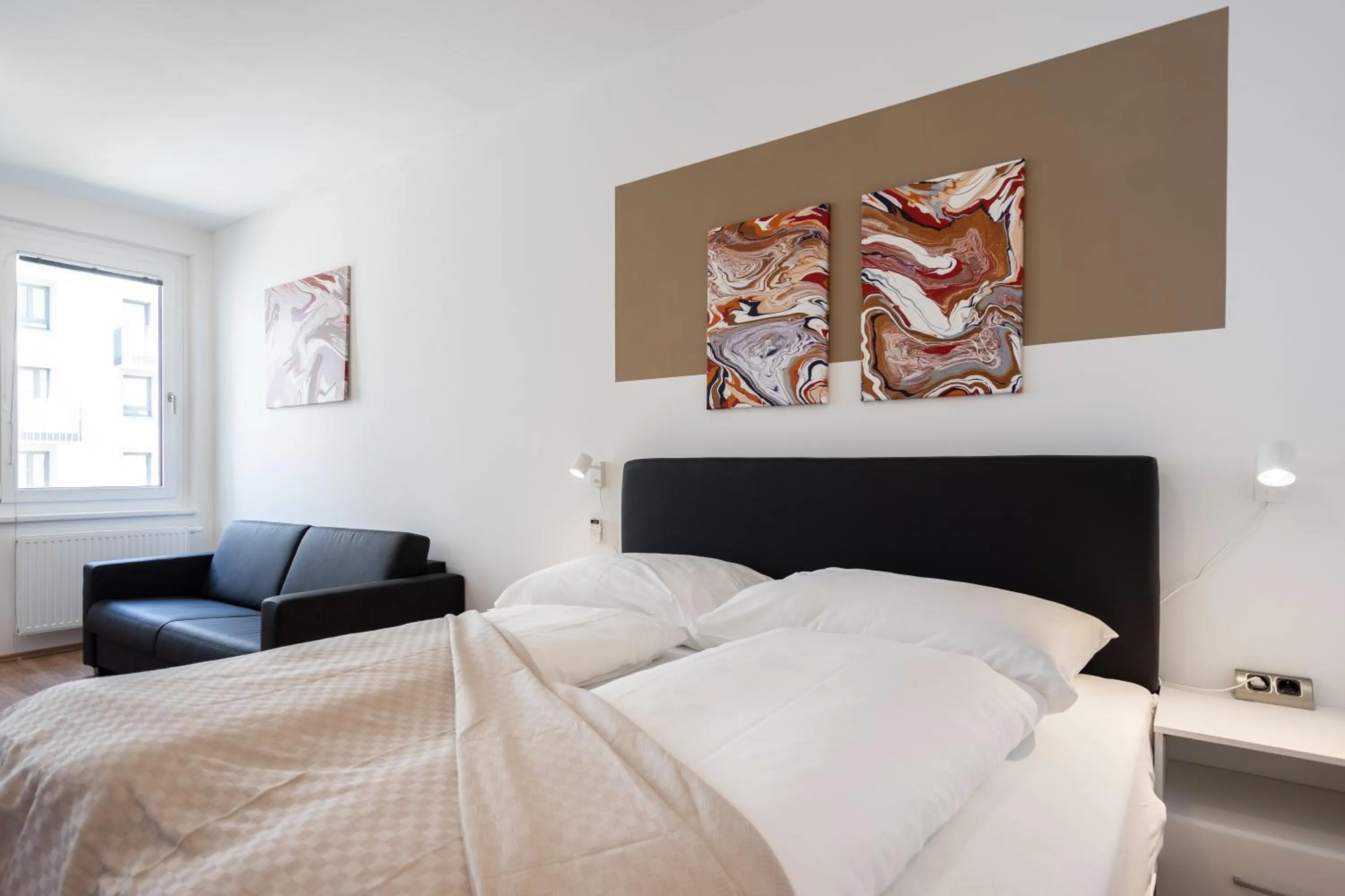 Bed in FeelGood Apartments LakeLiving inklusive Garagenplatz