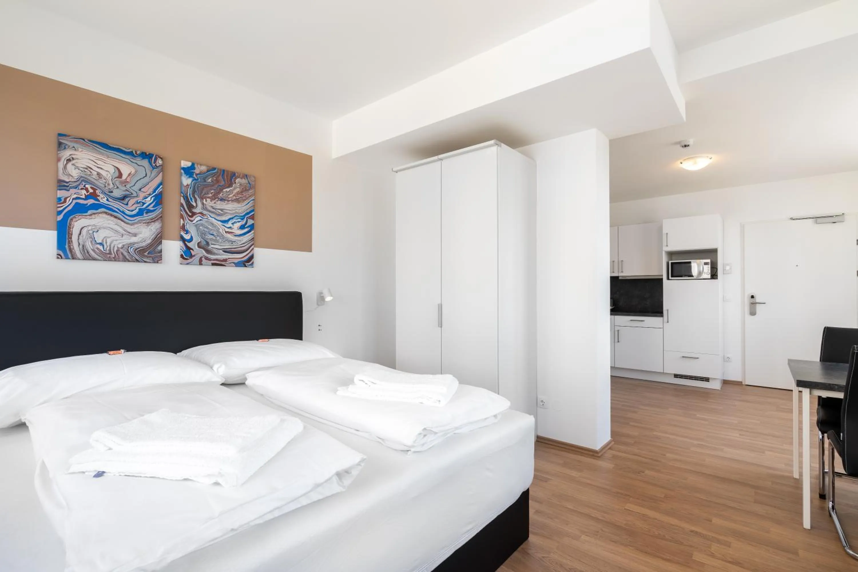 Bed in FeelGood Apartments LakeLiving inklusive Garagenplatz