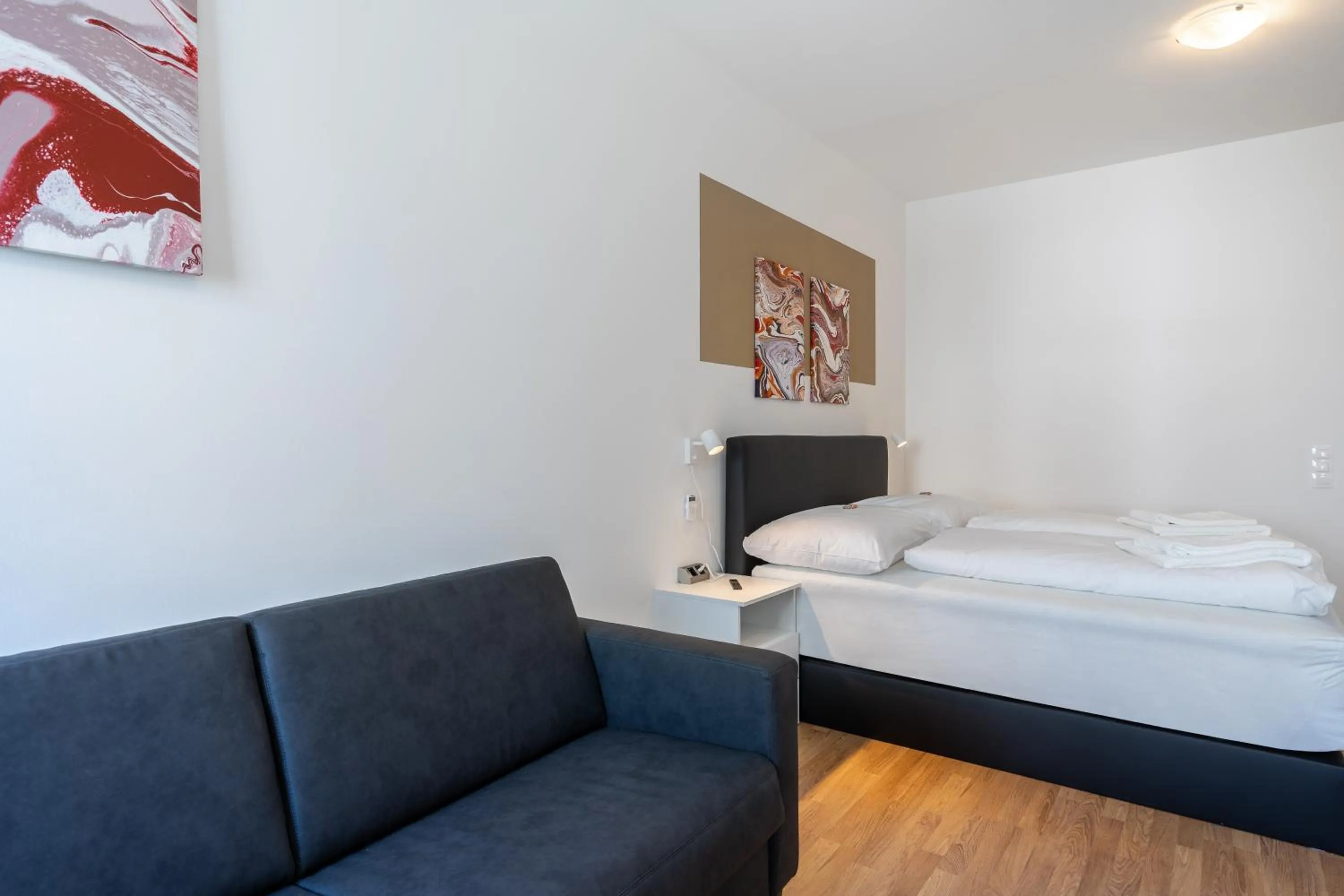 Bed in FeelGood Apartments LakeLiving inklusive Garagenplatz