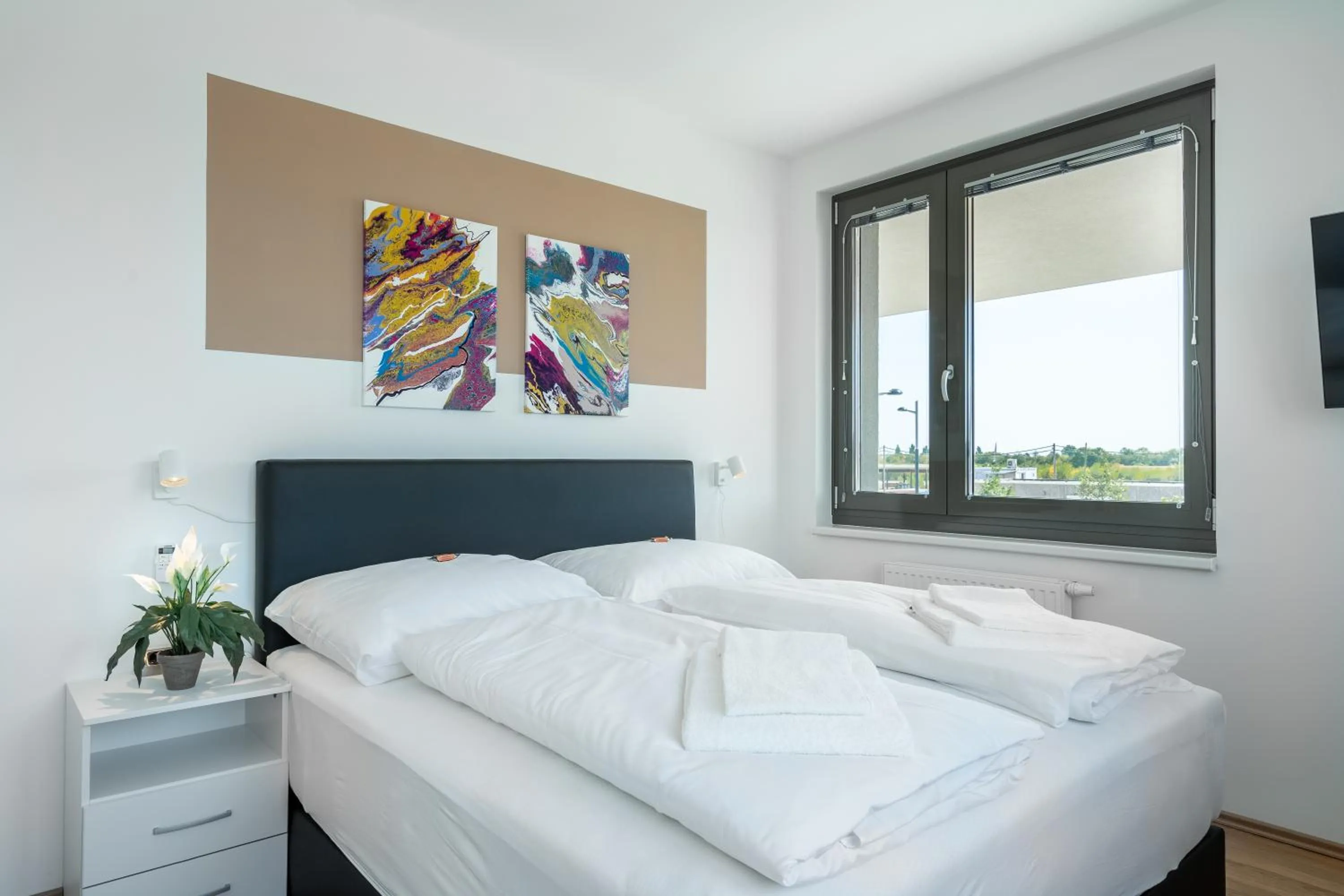 Bed in FeelGood Apartments LakeLiving inklusive Garagenplatz