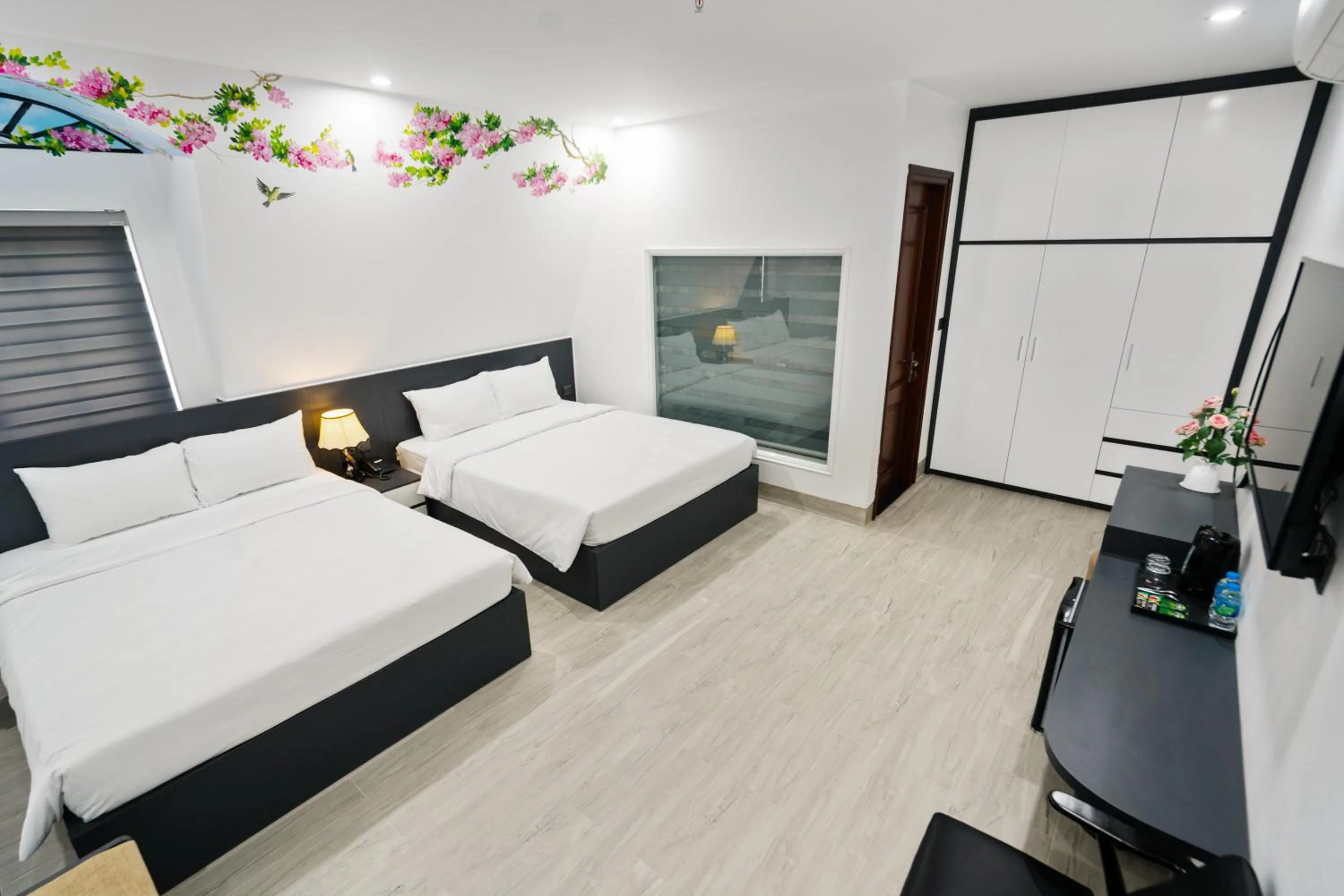 Photo of the whole room, Bed in The Enchanted Ha Long Hotel