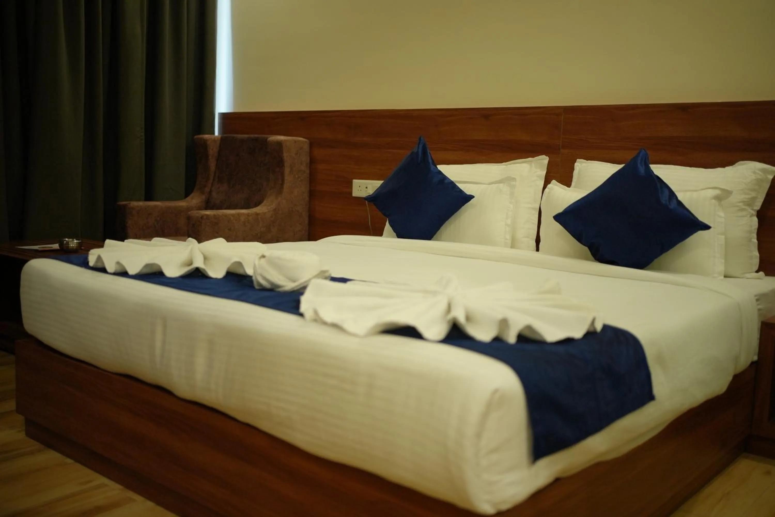 Bed in HOTEL MAKHAN VIHAR