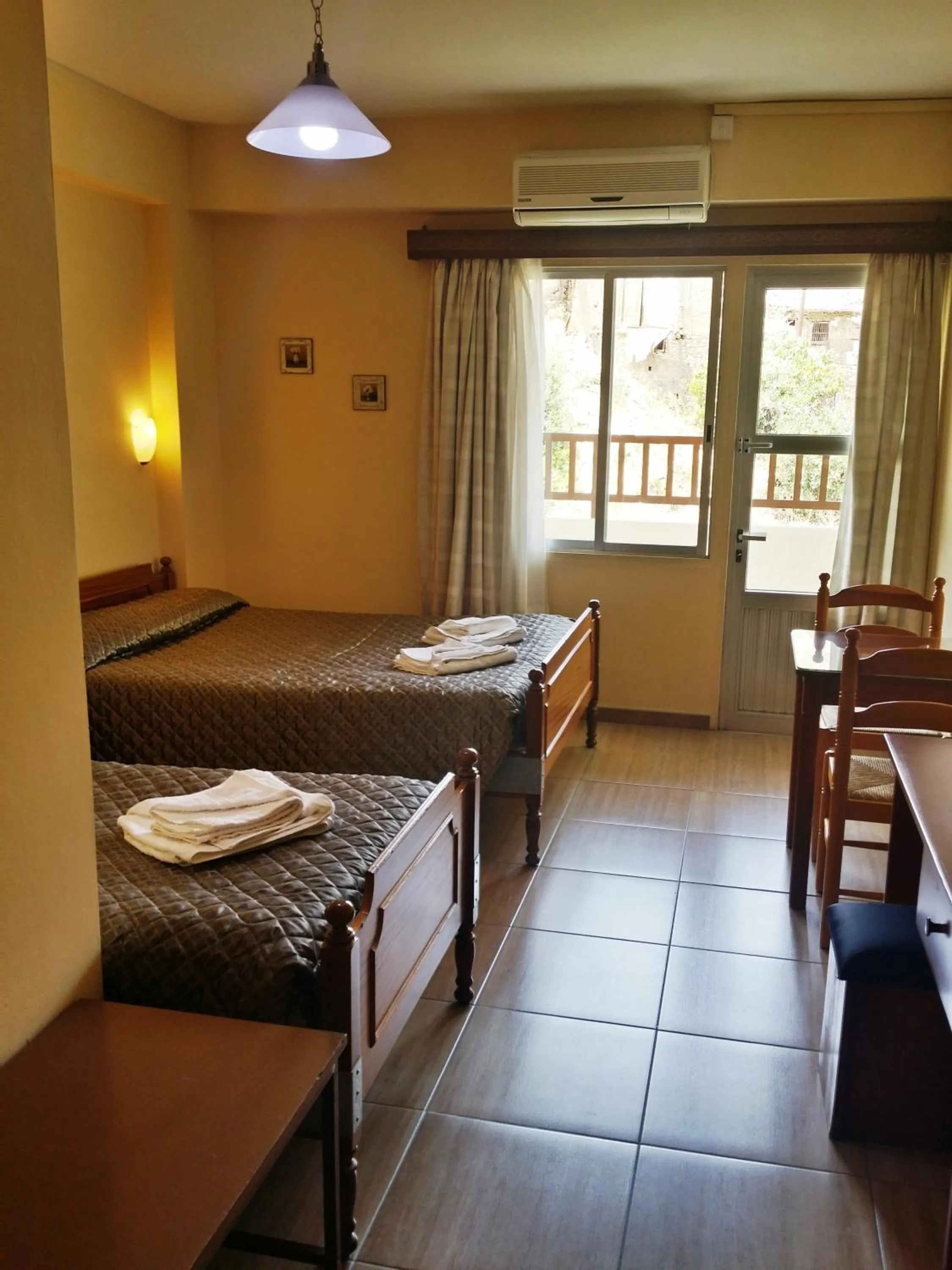 Bed in Minaides Hotel