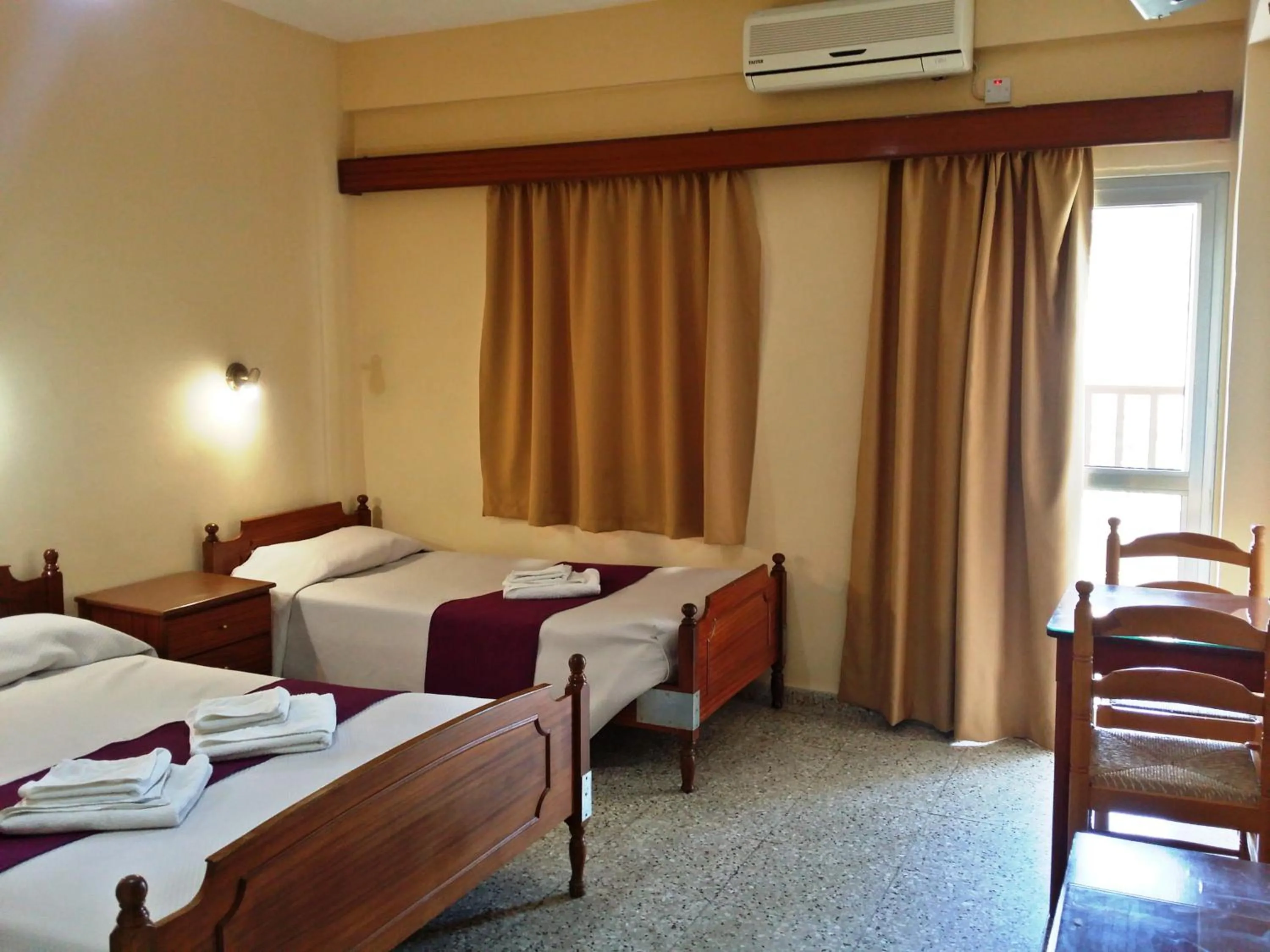 Bed in Minaides Hotel