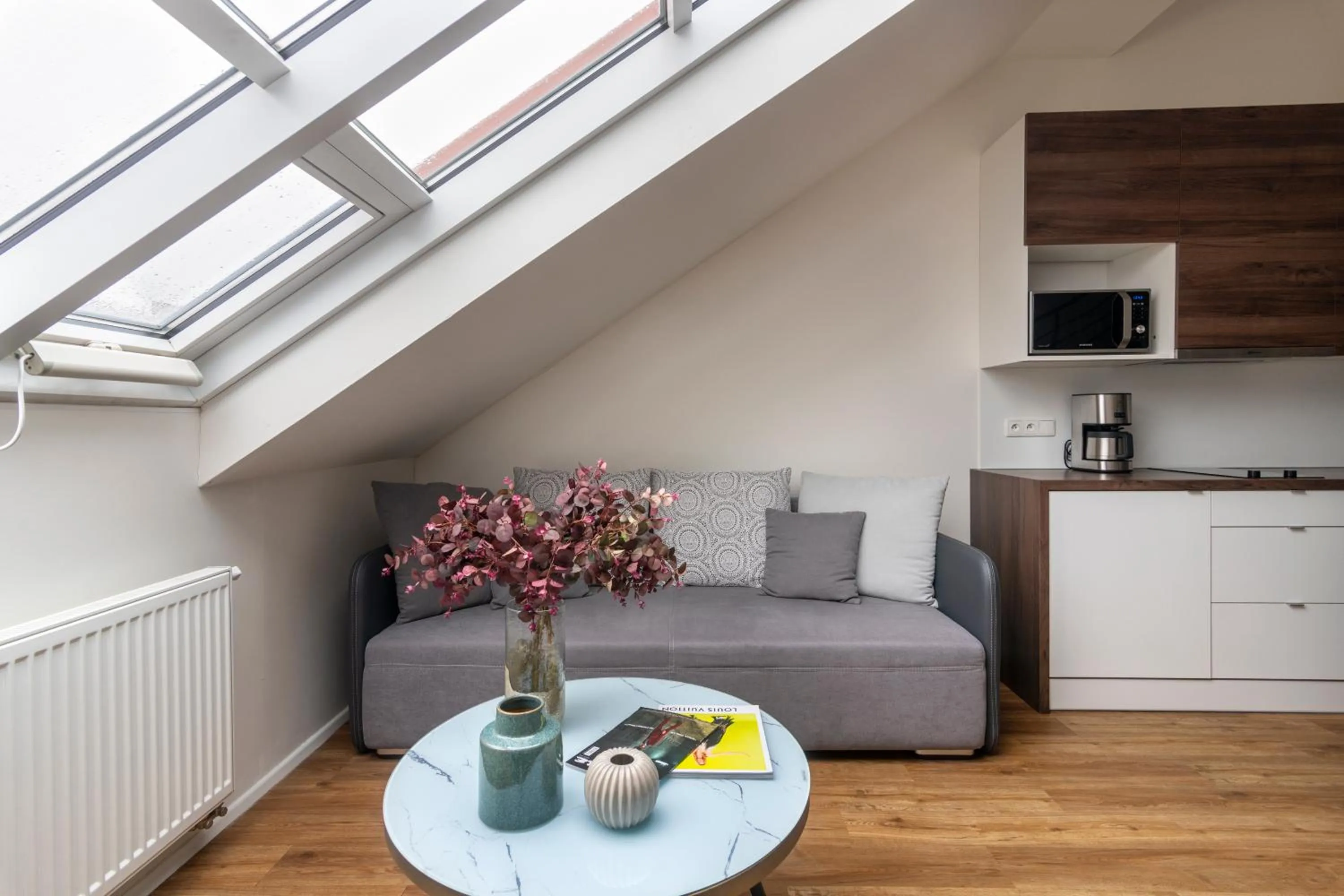 Seating area in Prague Tales Boutique Residence by Dwellfort