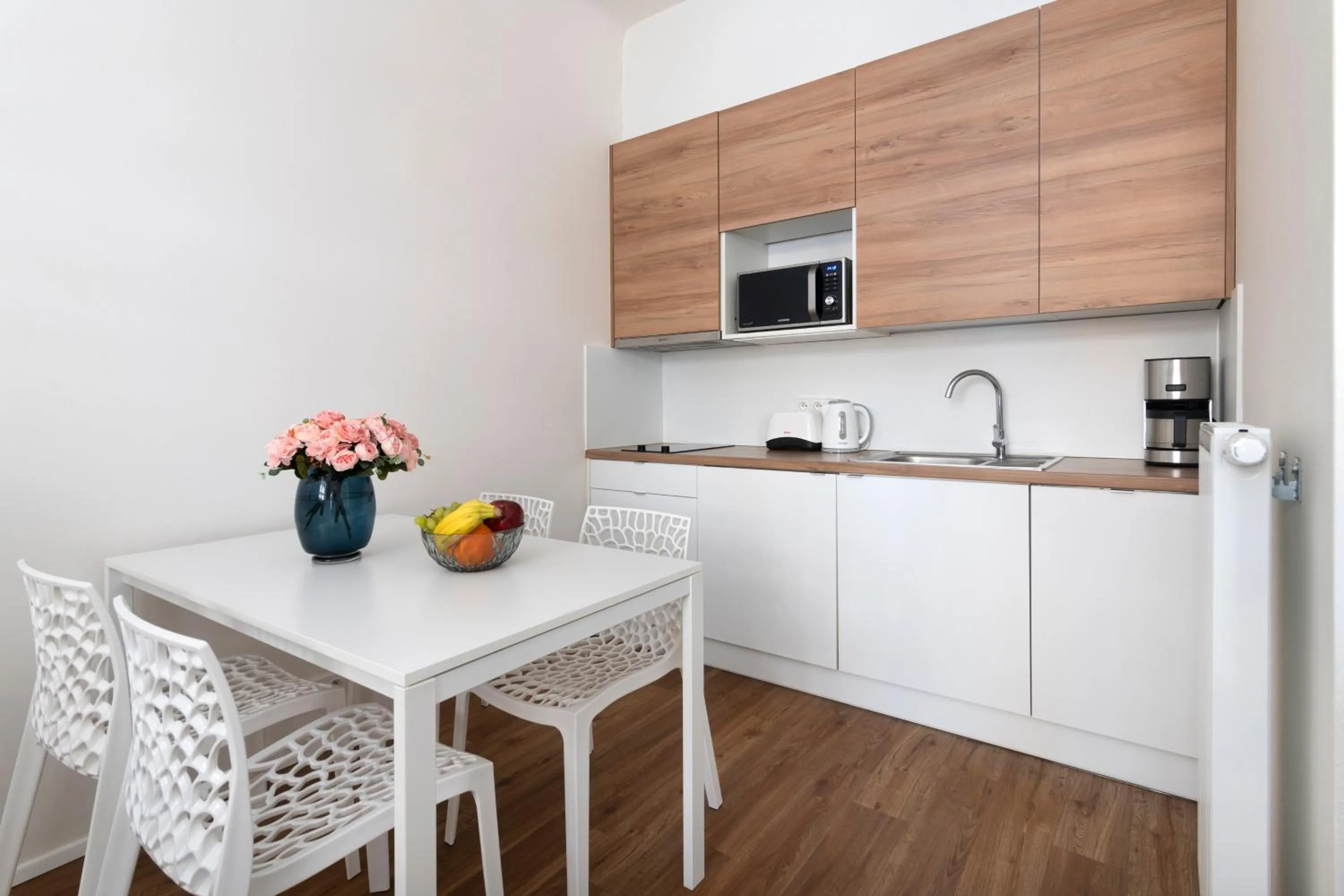 Dining area in Prague Tales Boutique Residence by Dwellfort