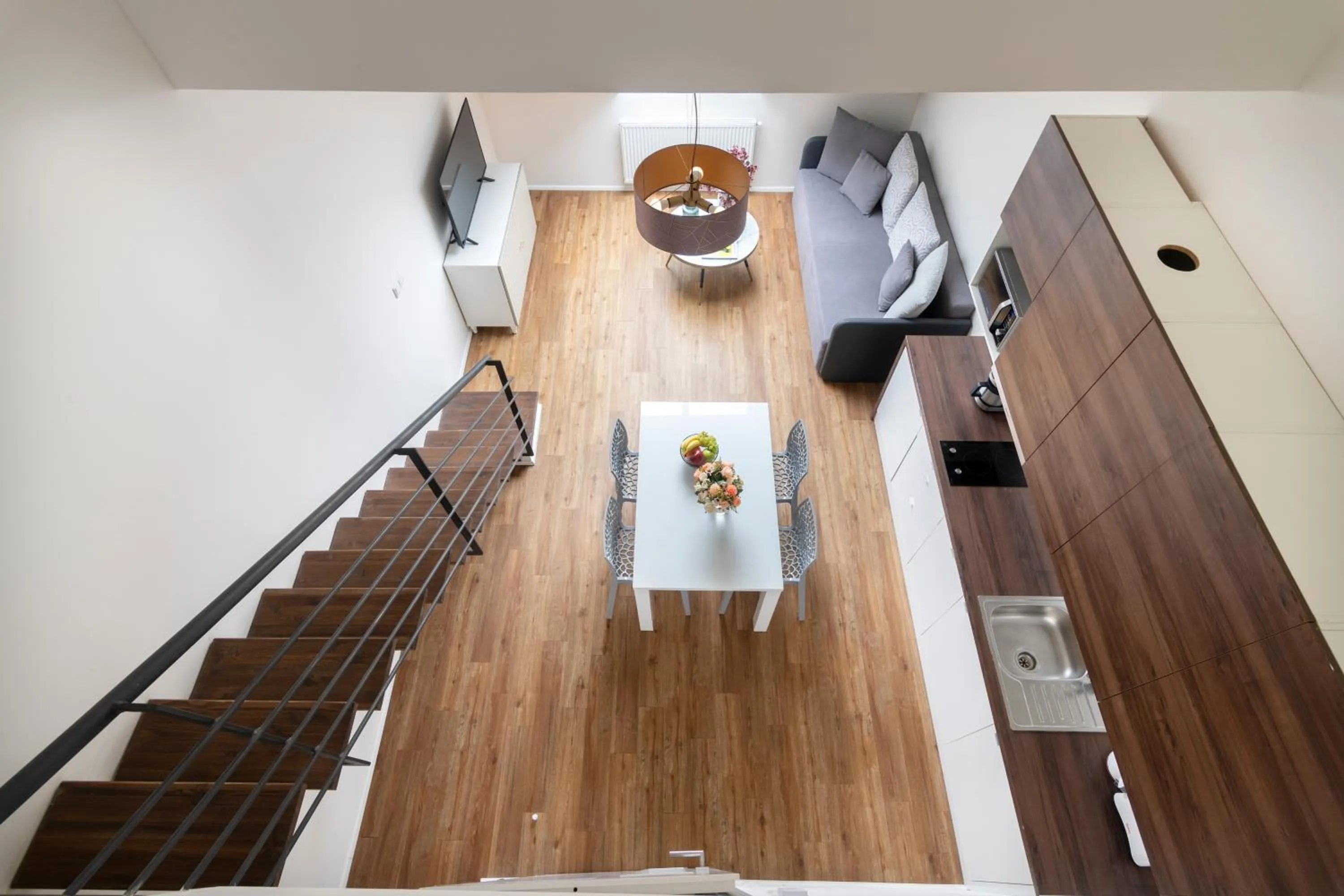 Living room in Prague Tales Boutique Residence by Dwellfort