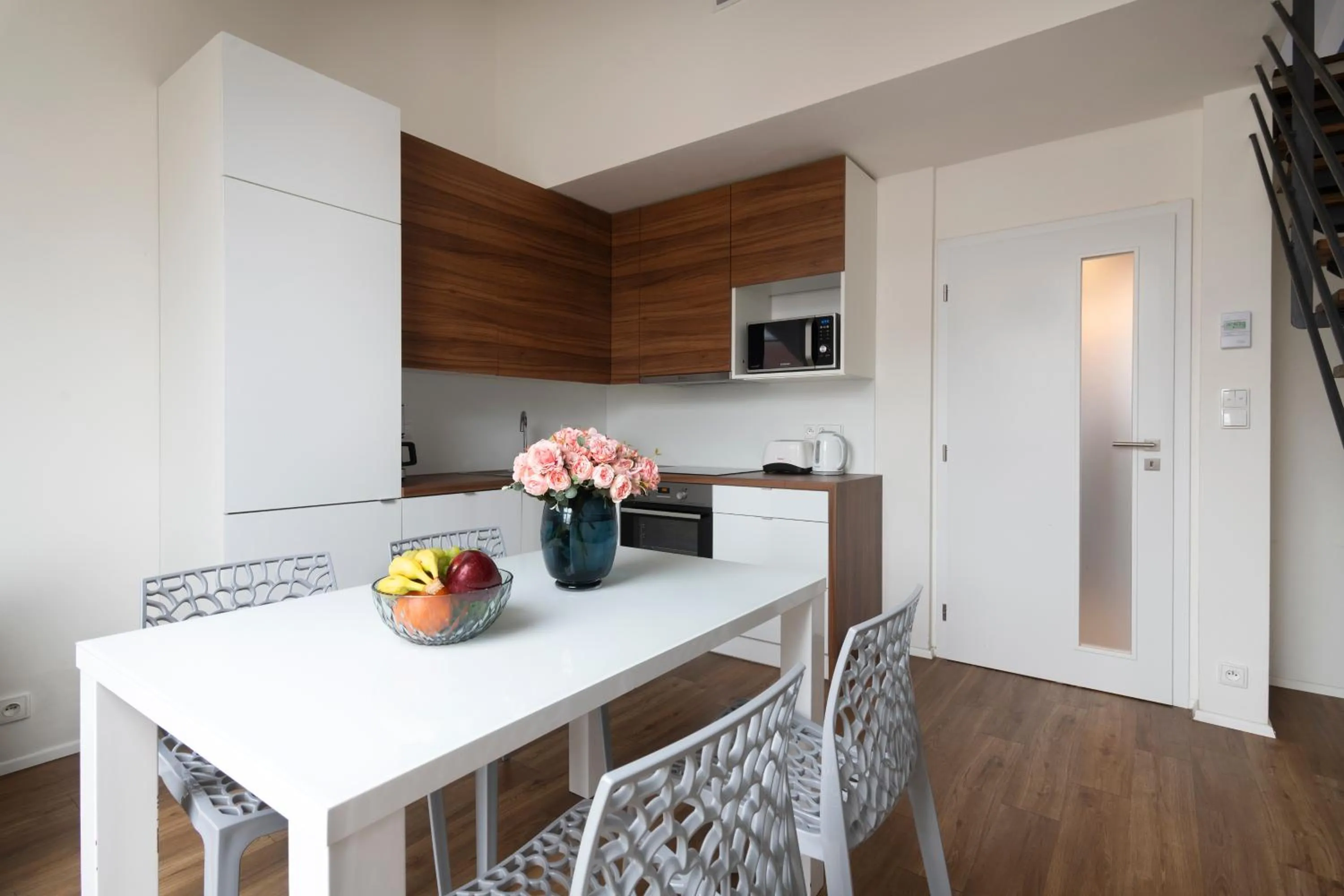 Dining area in Prague Tales Boutique Residence by Dwellfort