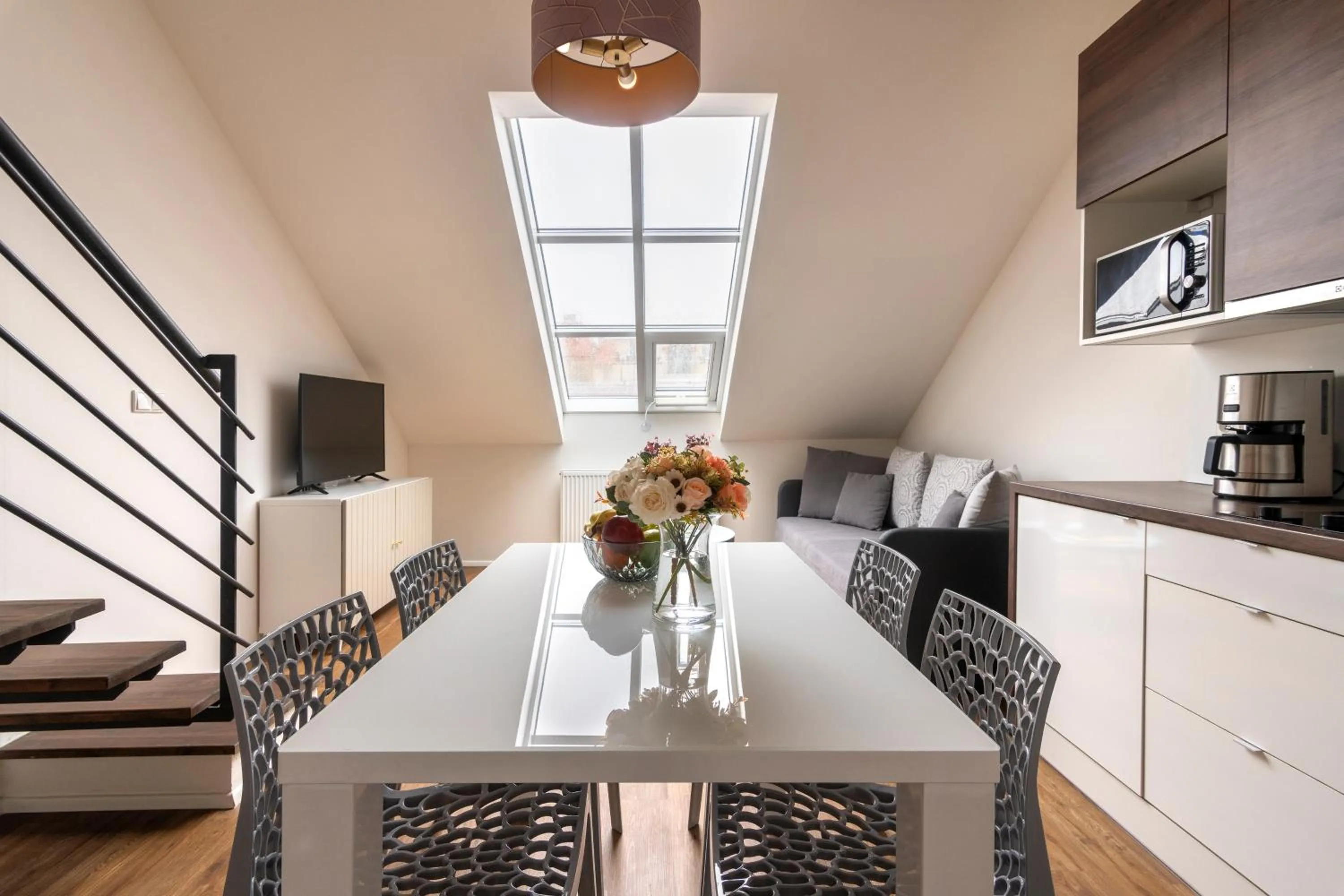 Living room in Prague Tales Boutique Residence by Dwellfort