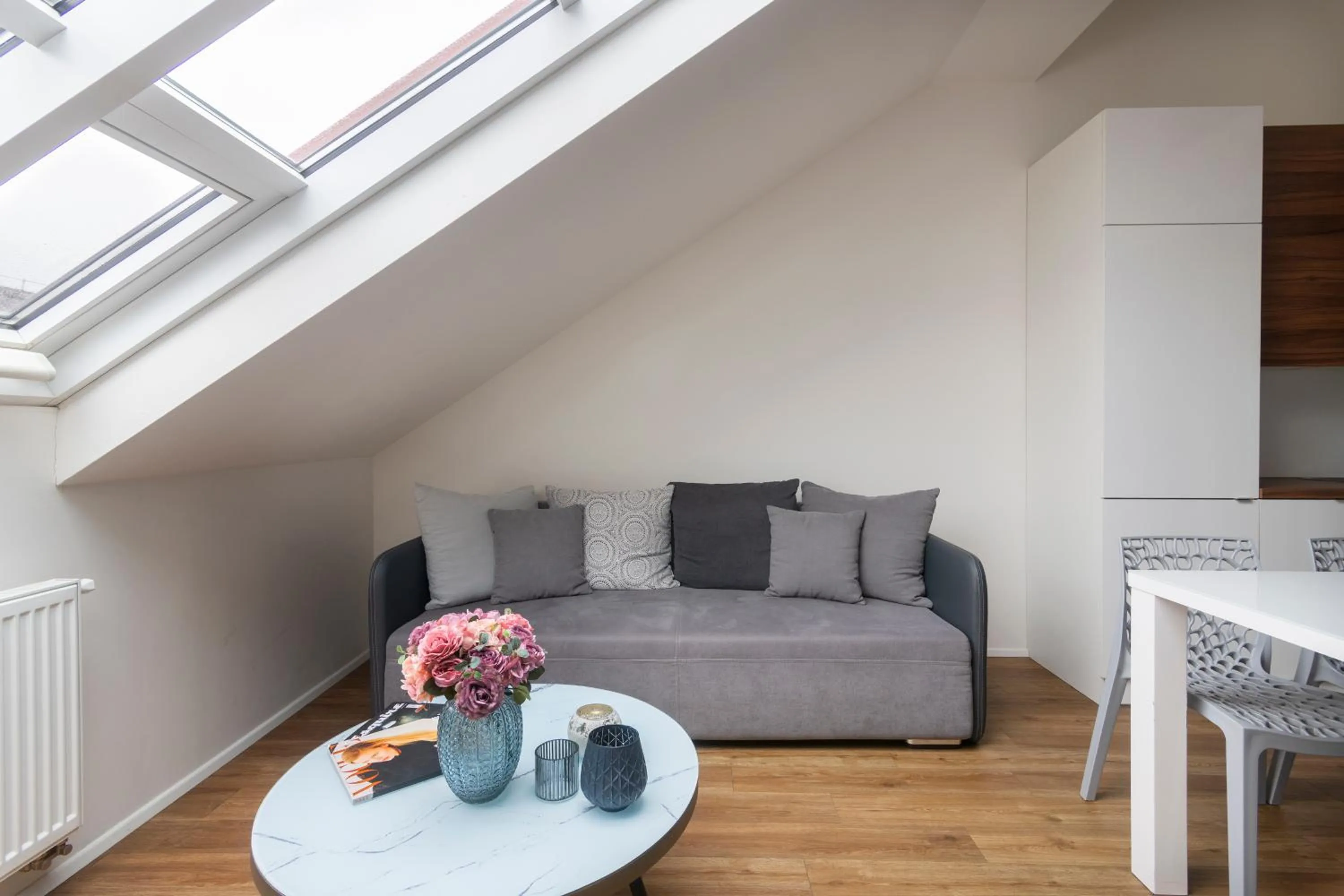 Seating area in Prague Tales Boutique Residence by Dwellfort