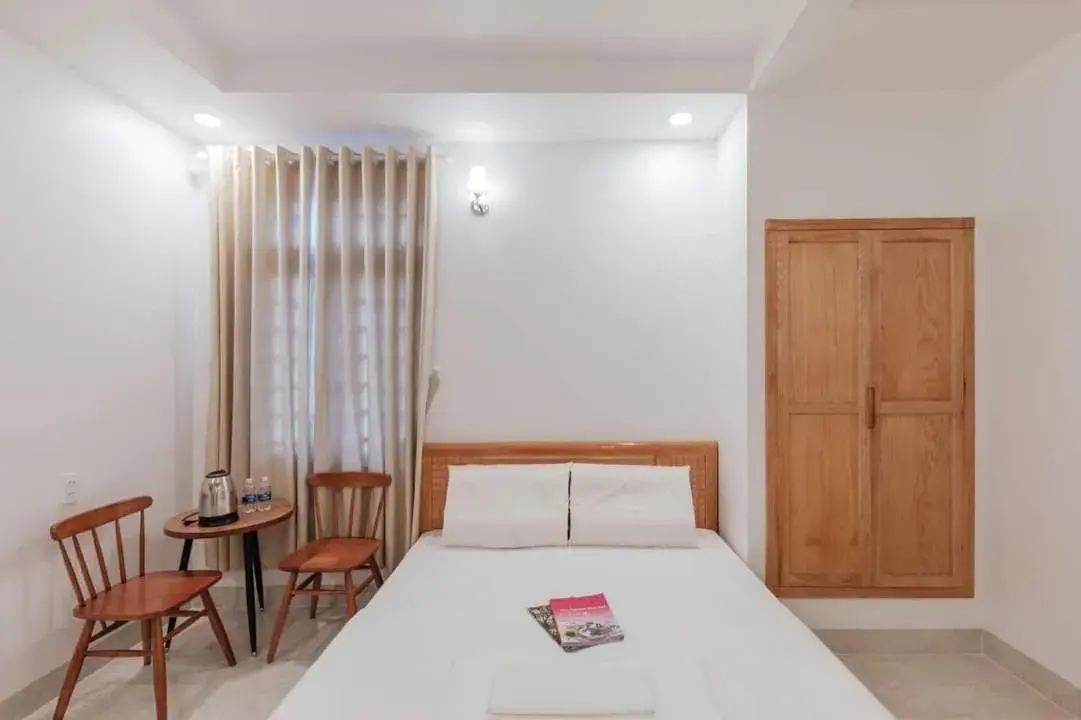 Deluxe Room (2 Adults + 1 Child) in Bao Phuc Hotel Deluxe Room (2 Adults + 1 Child) in Bao Phuc Hotel