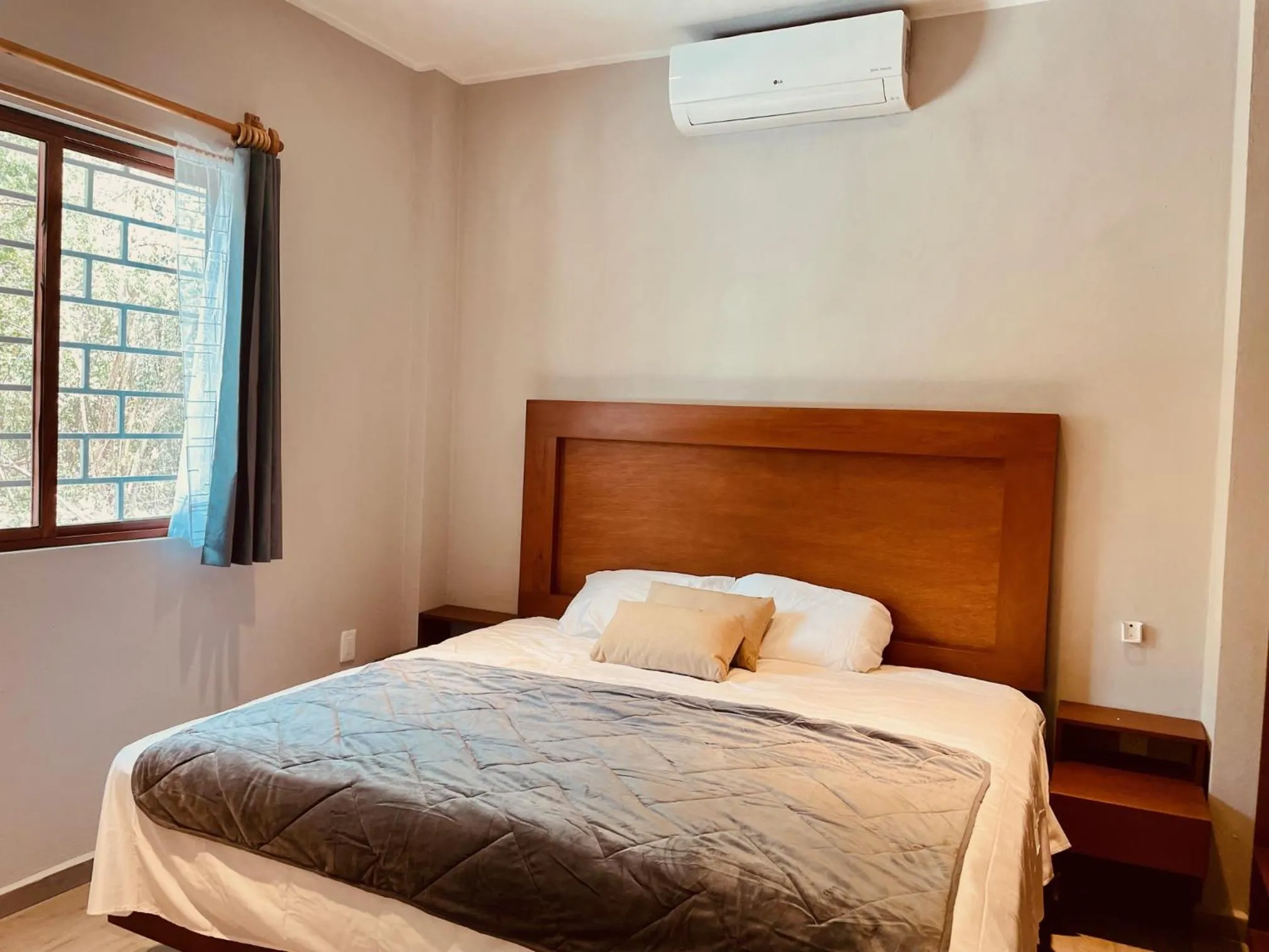 Bed in Hotel Manglar Suites