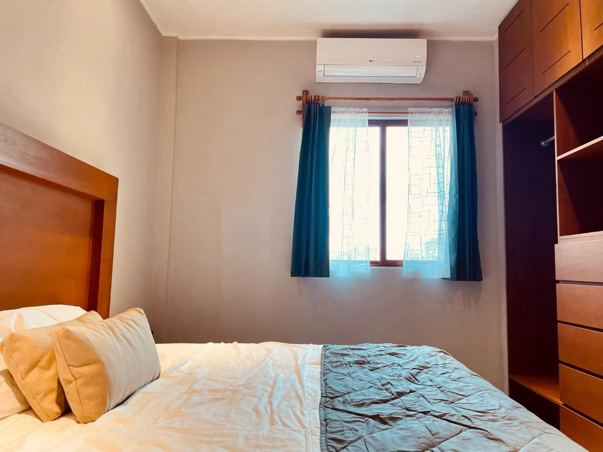 Bed in Hotel Manglar Suites