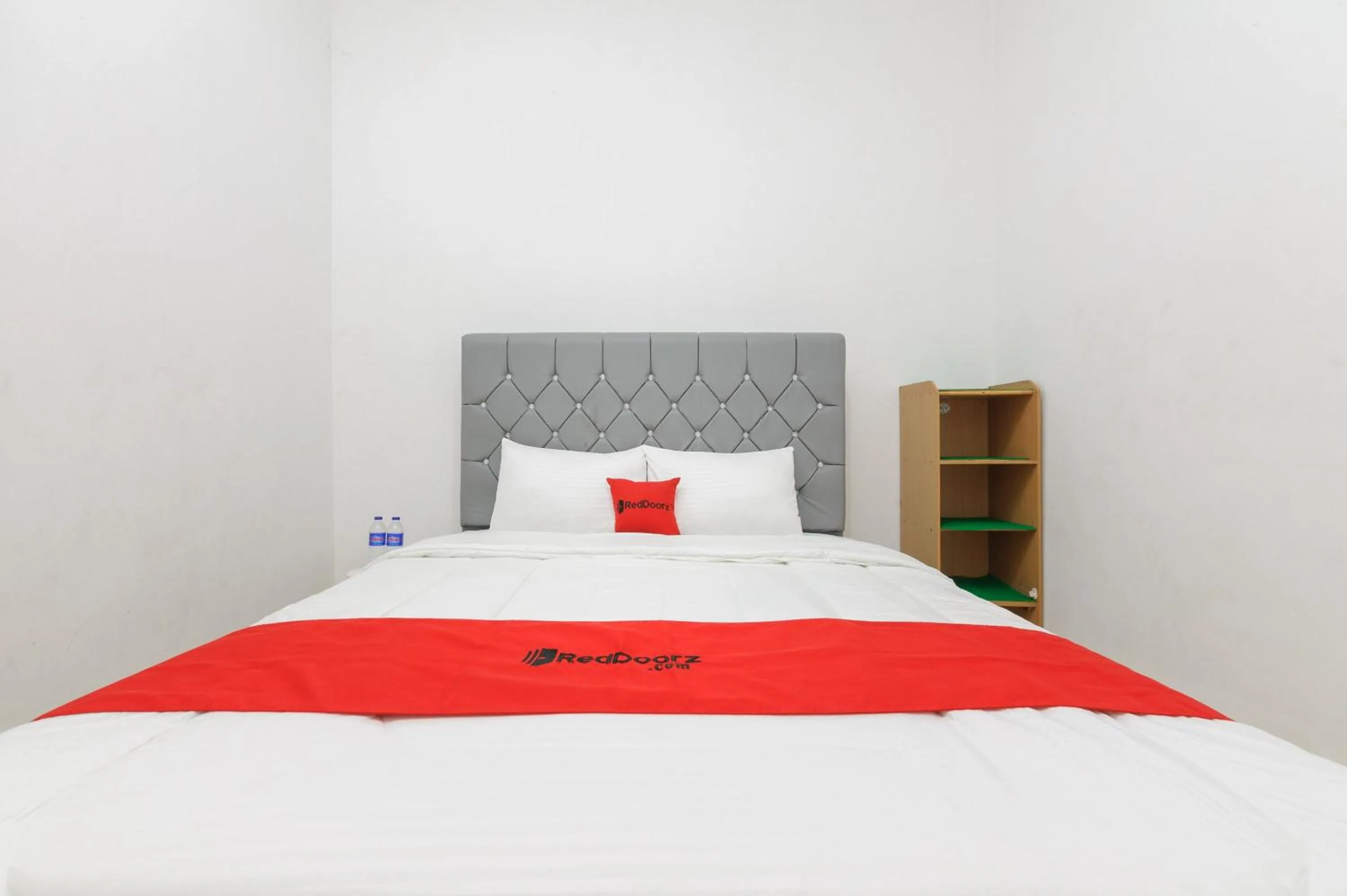 Bed in RedDoorz Syariah near Institut Darmajaya Lampung