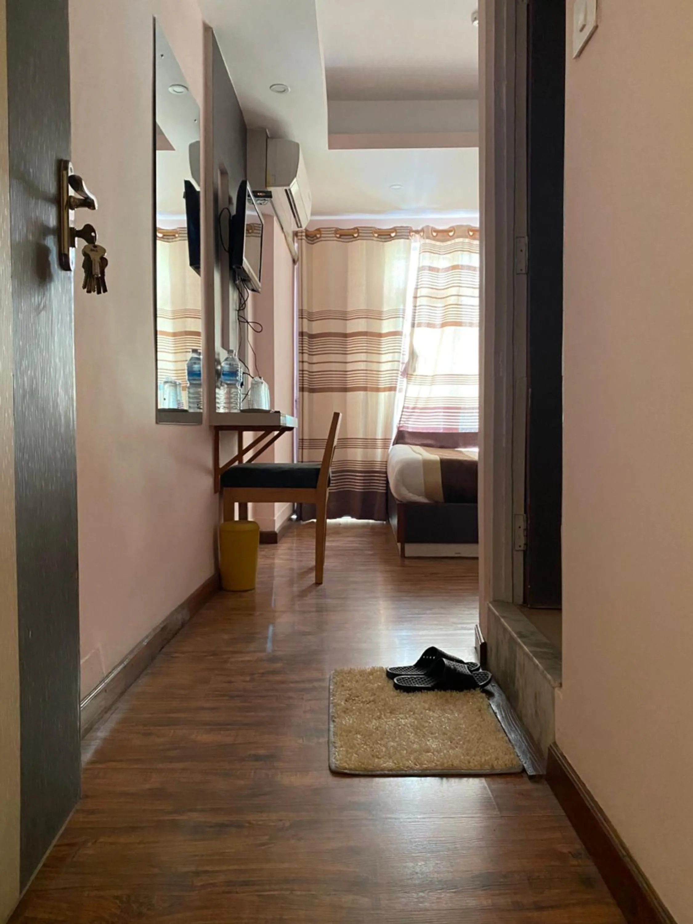 Living room, Bed in Lemon Tree Hotel Pvt. Ltd