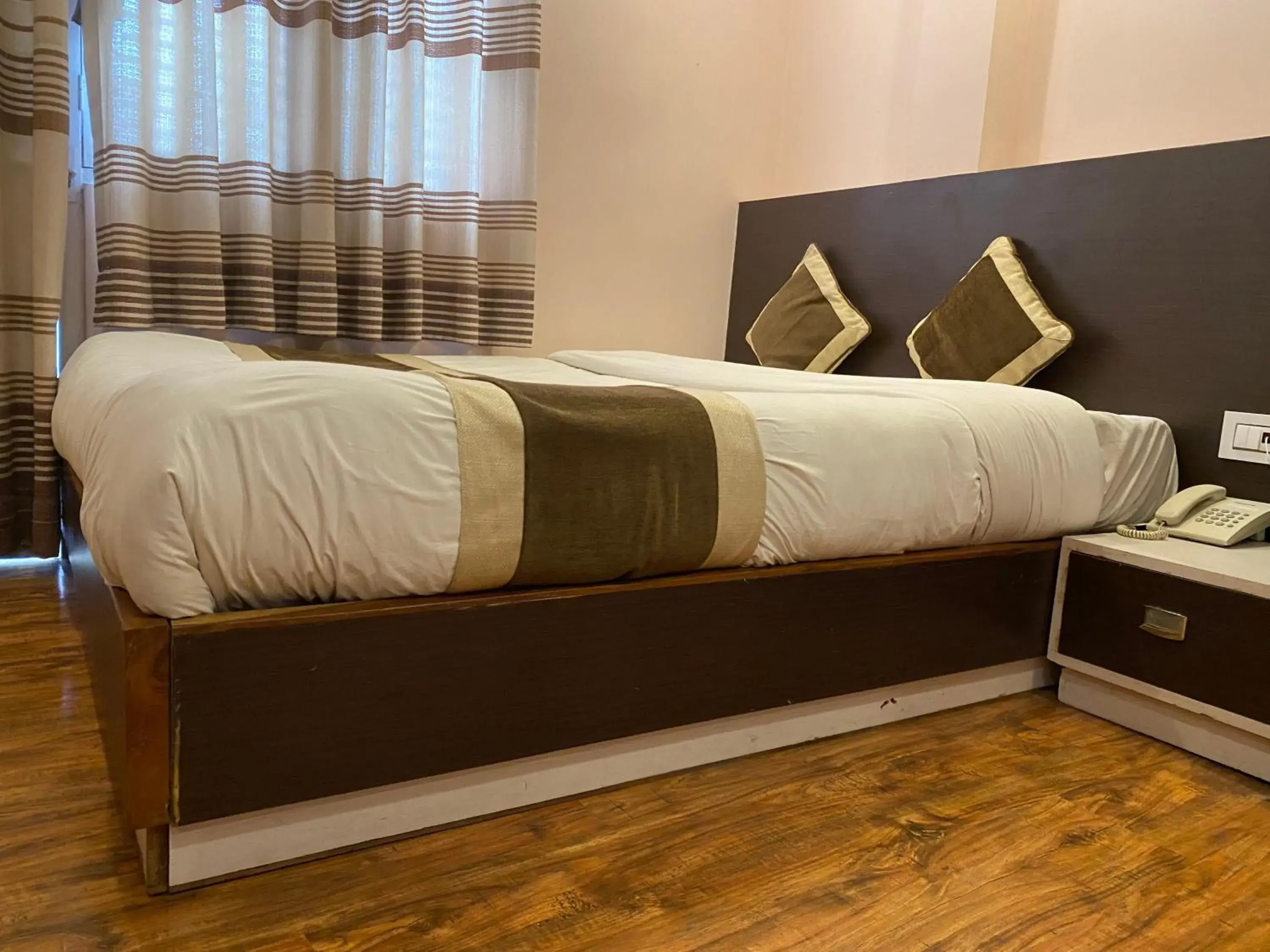 Bed in Lemon Tree Hotel Pvt. Ltd