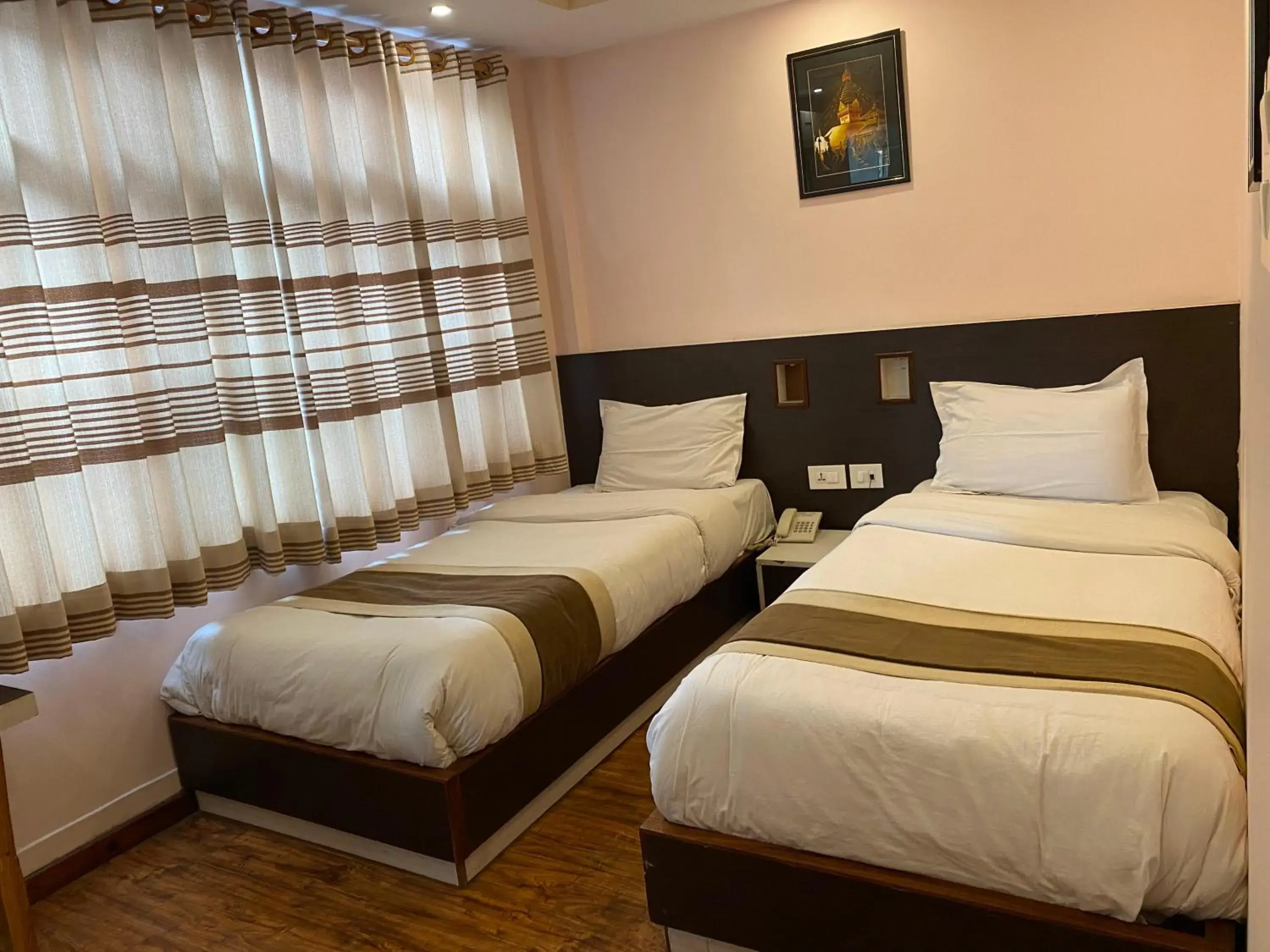 Bed in Lemon Tree Hotel Pvt. Ltd