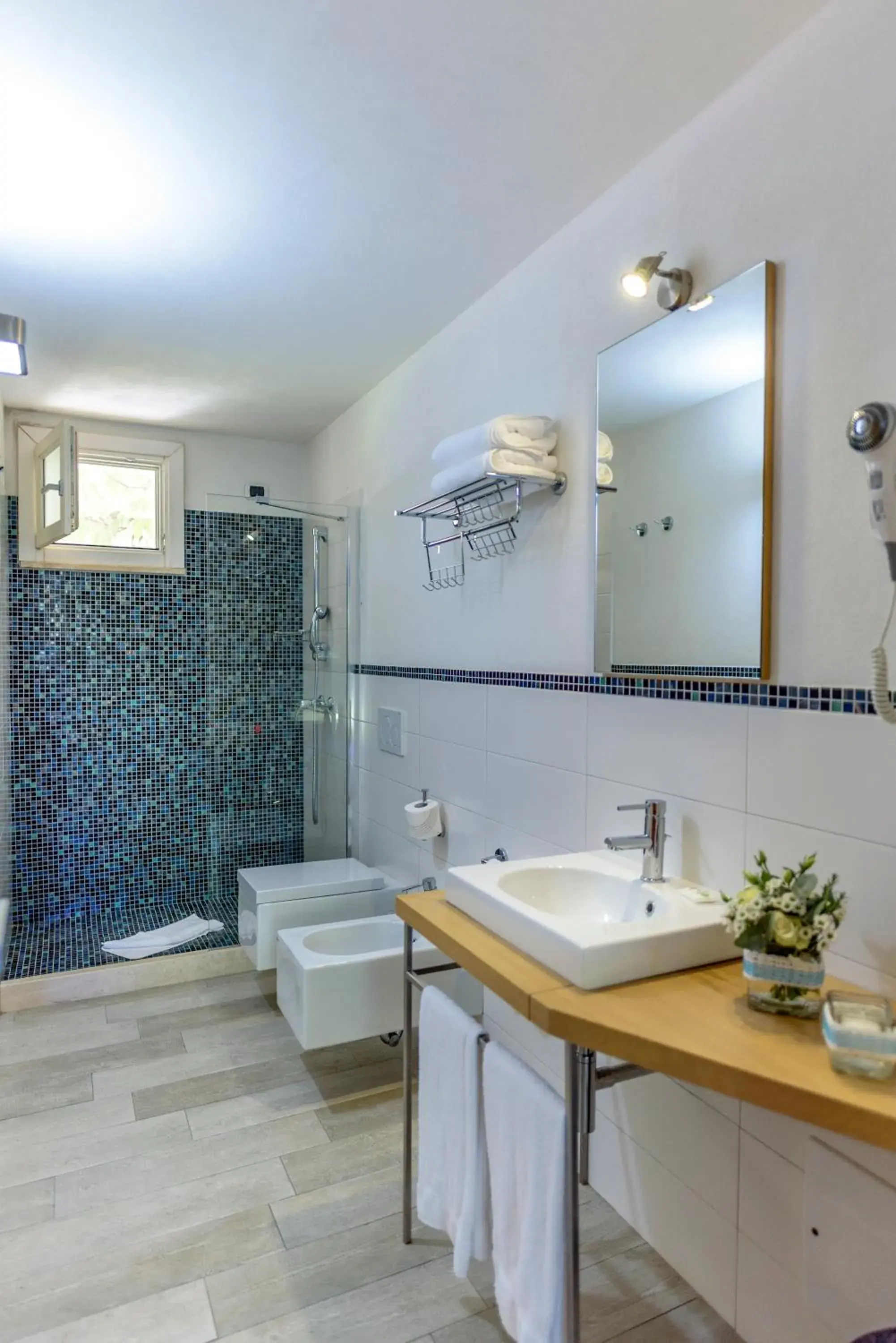 Bathroom in Hotel Garden Beach Bathroom in Hotel Garden Beach