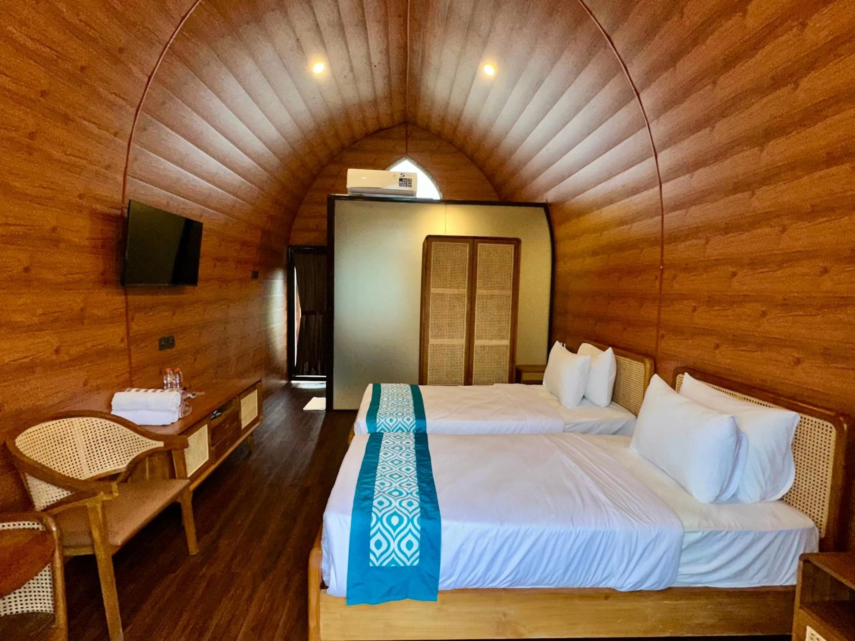 Bed in Nirvana Hotel Resort Tetebatu