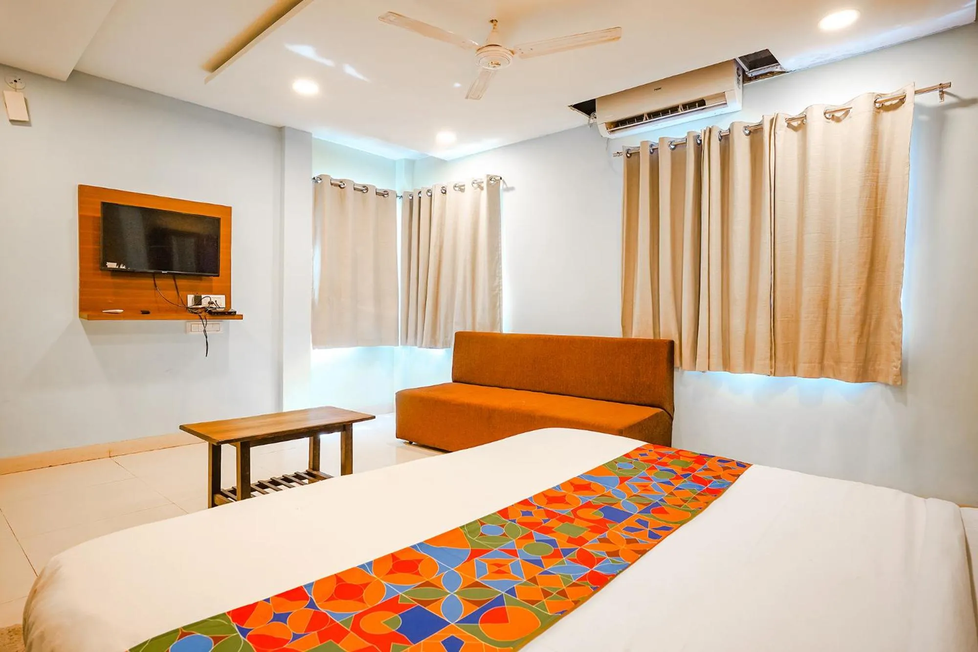 Bed in FabHotel Uday Vilas