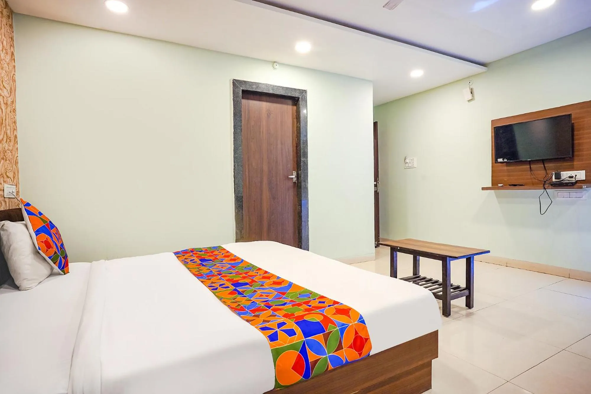 Bed in FabHotel Uday Vilas