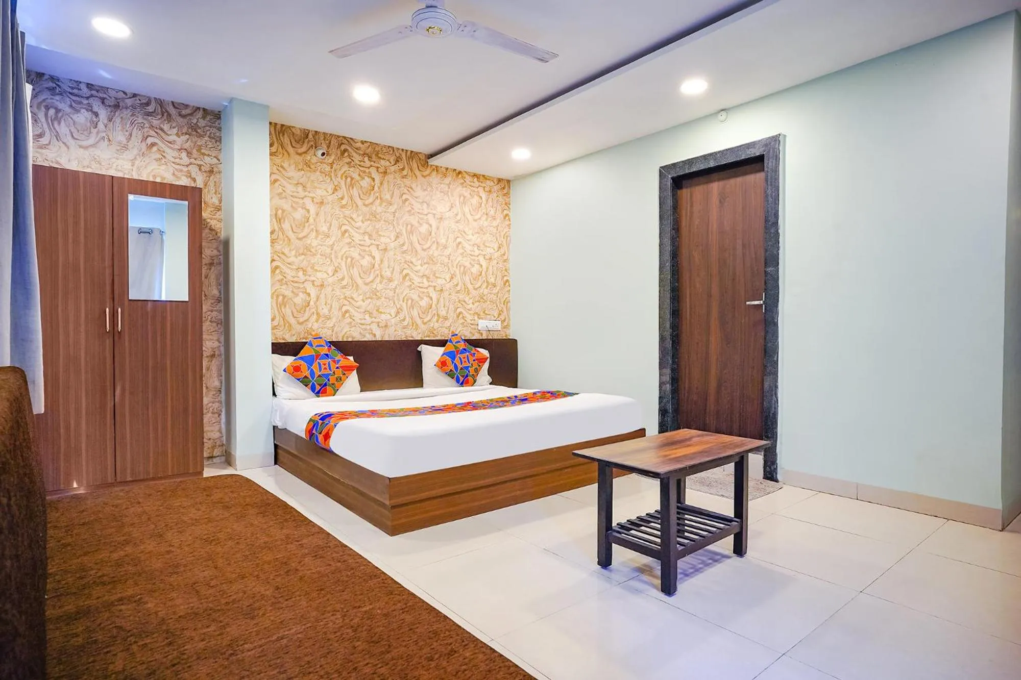 Bed in FabHotel Uday Vilas