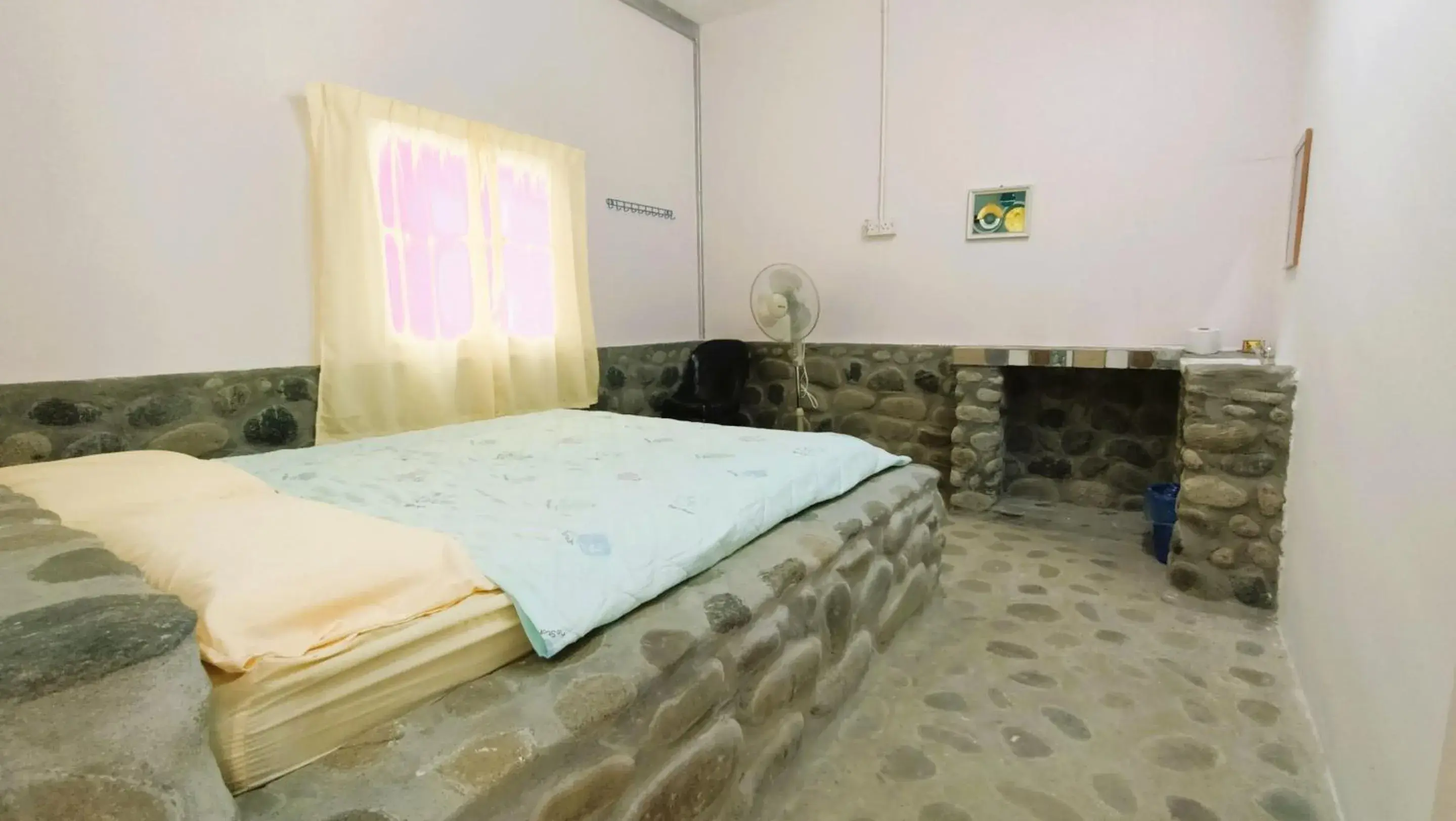 Bedroom in Hotel O Flinstone Lodge Bedroom in Hotel O Flinstone Lodge