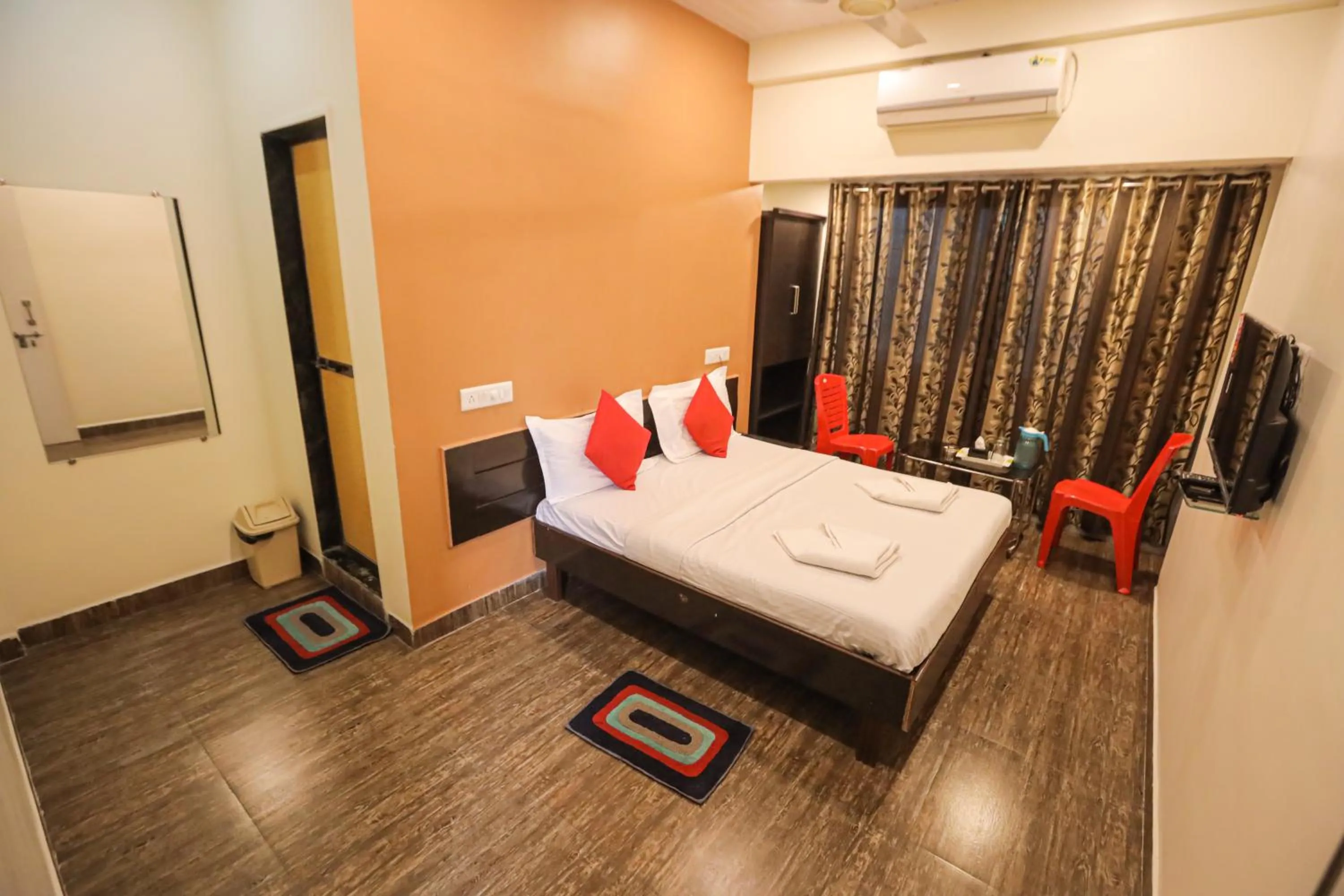 Bed in Hotel Sai Niwas