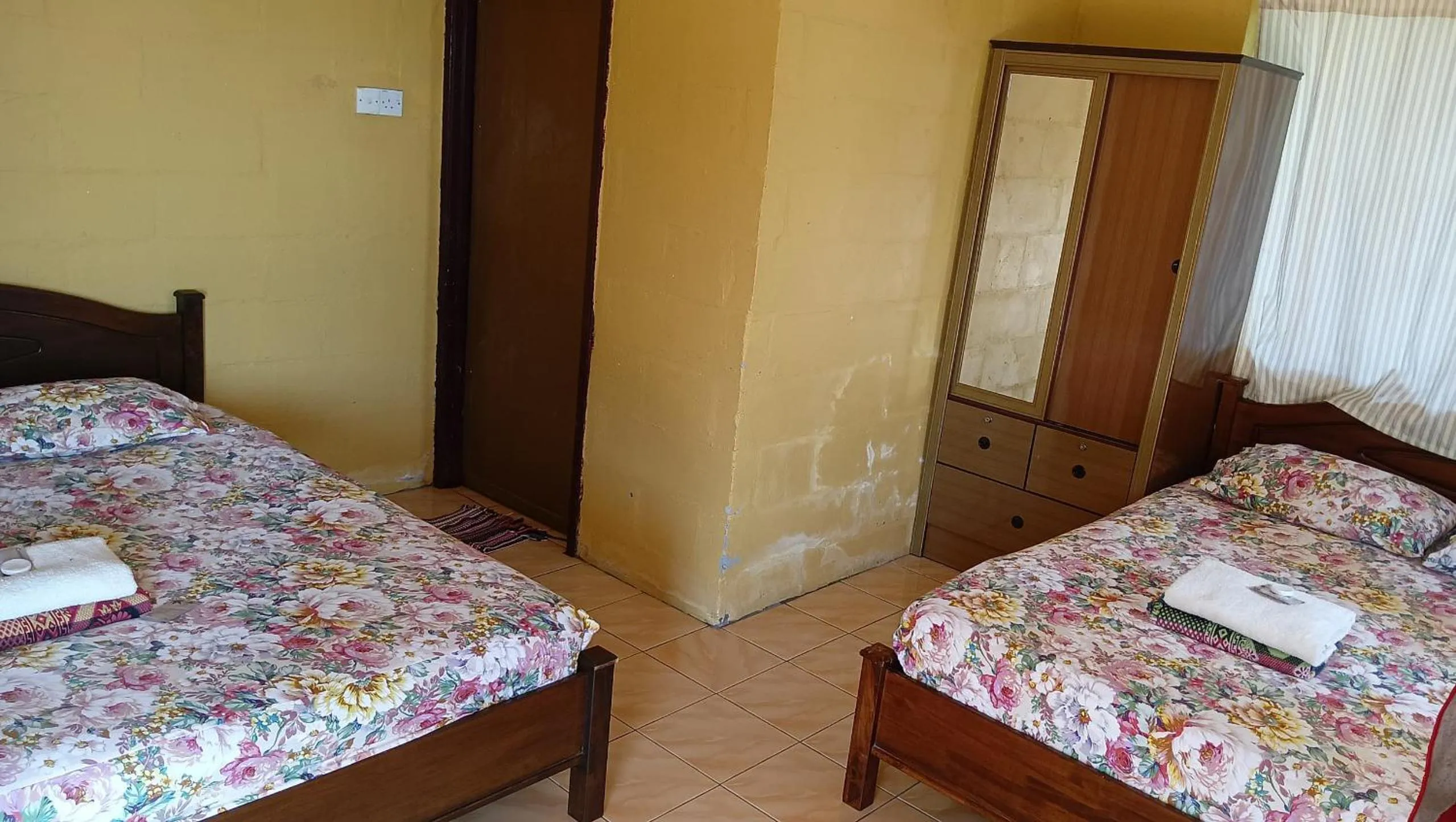 Bed in KAMILA MOTEL TELUK SENANGIN