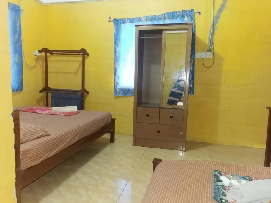 Bed in KAMILA MOTEL TELUK SENANGIN