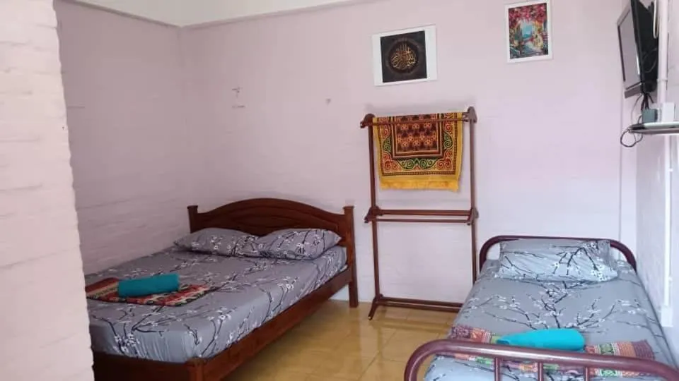 Bed in KAMILA MOTEL TELUK SENANGIN