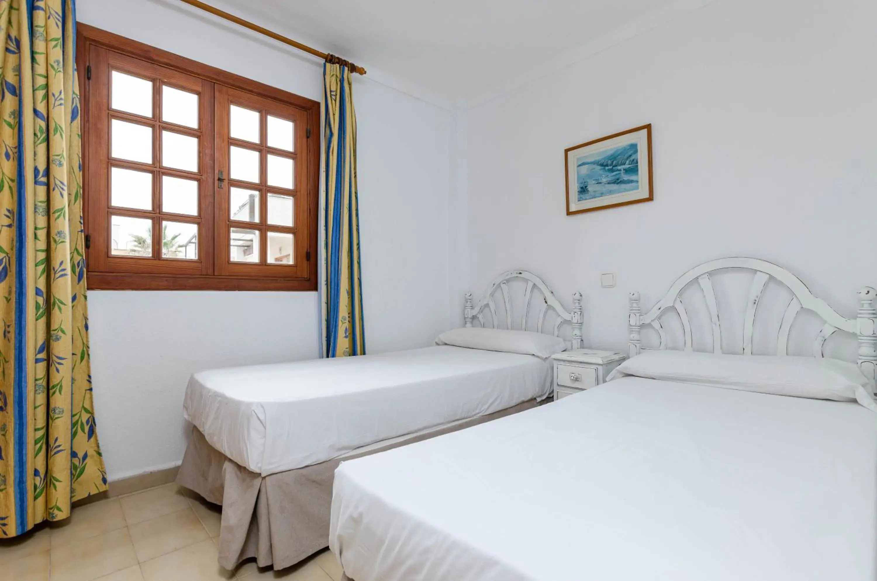 Bed in Sol y Mar Apartments Bed in Sol y Mar Apartments