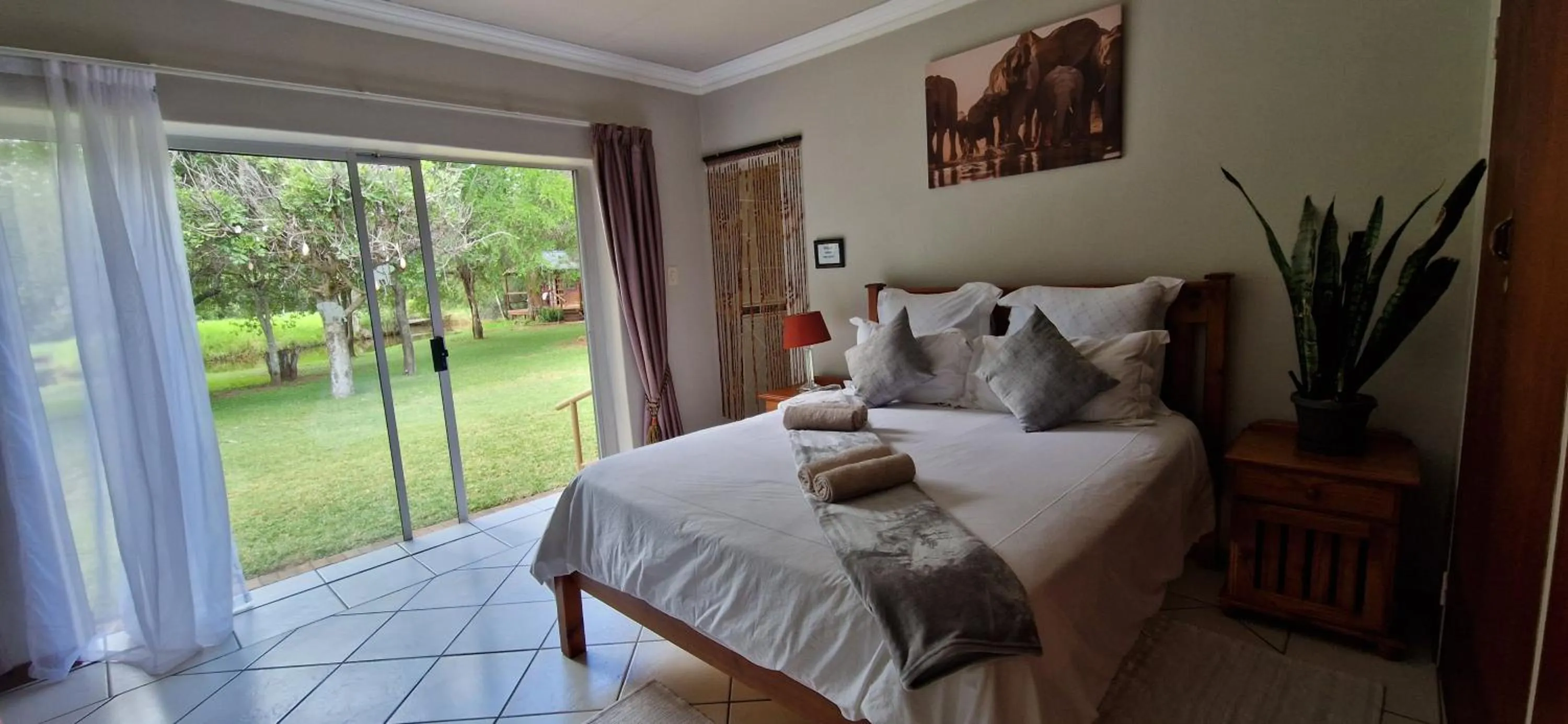 Bed in Tamboti Bush Lodge