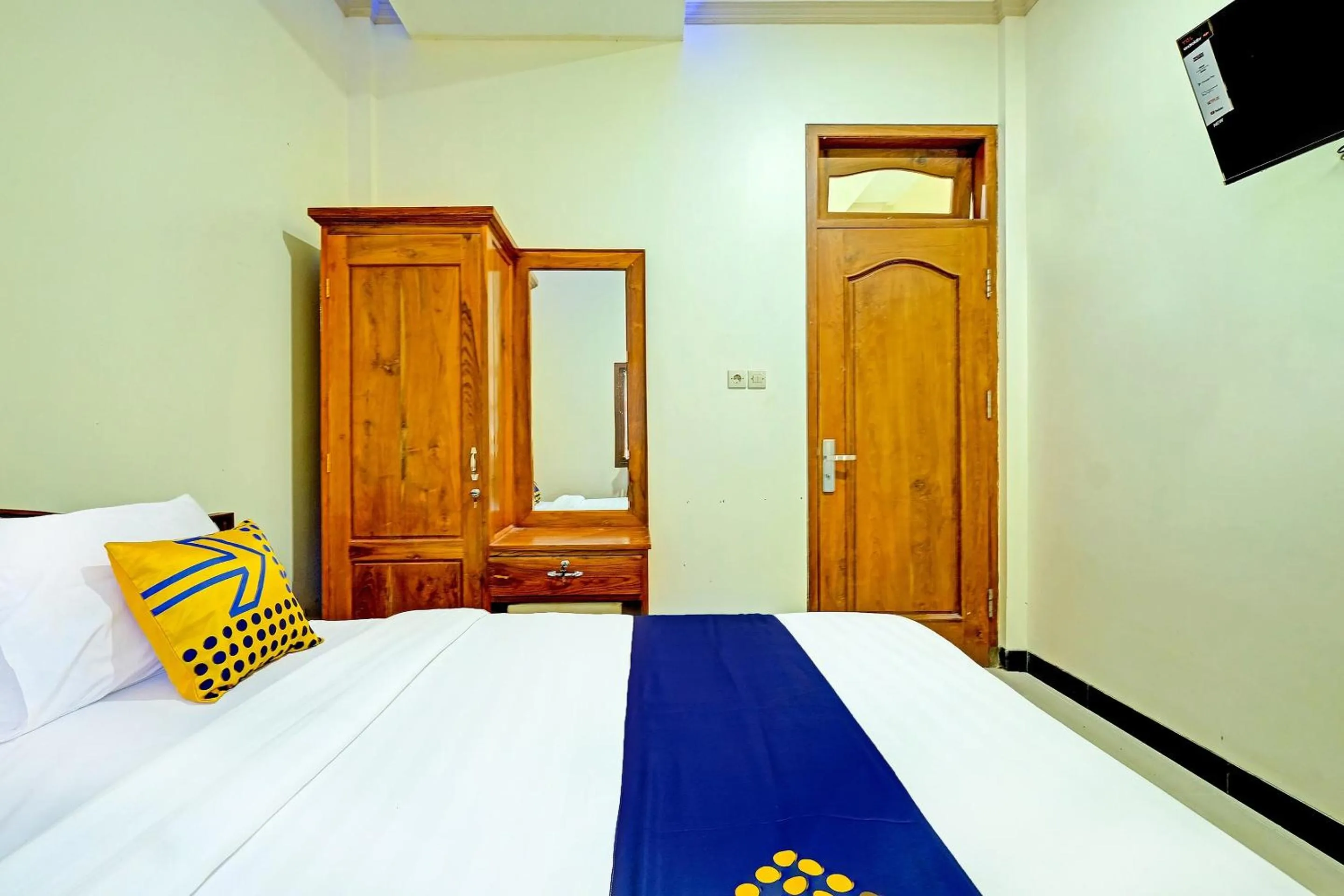 Bedroom in OYO Homes 91095 Desa Wisata Conto