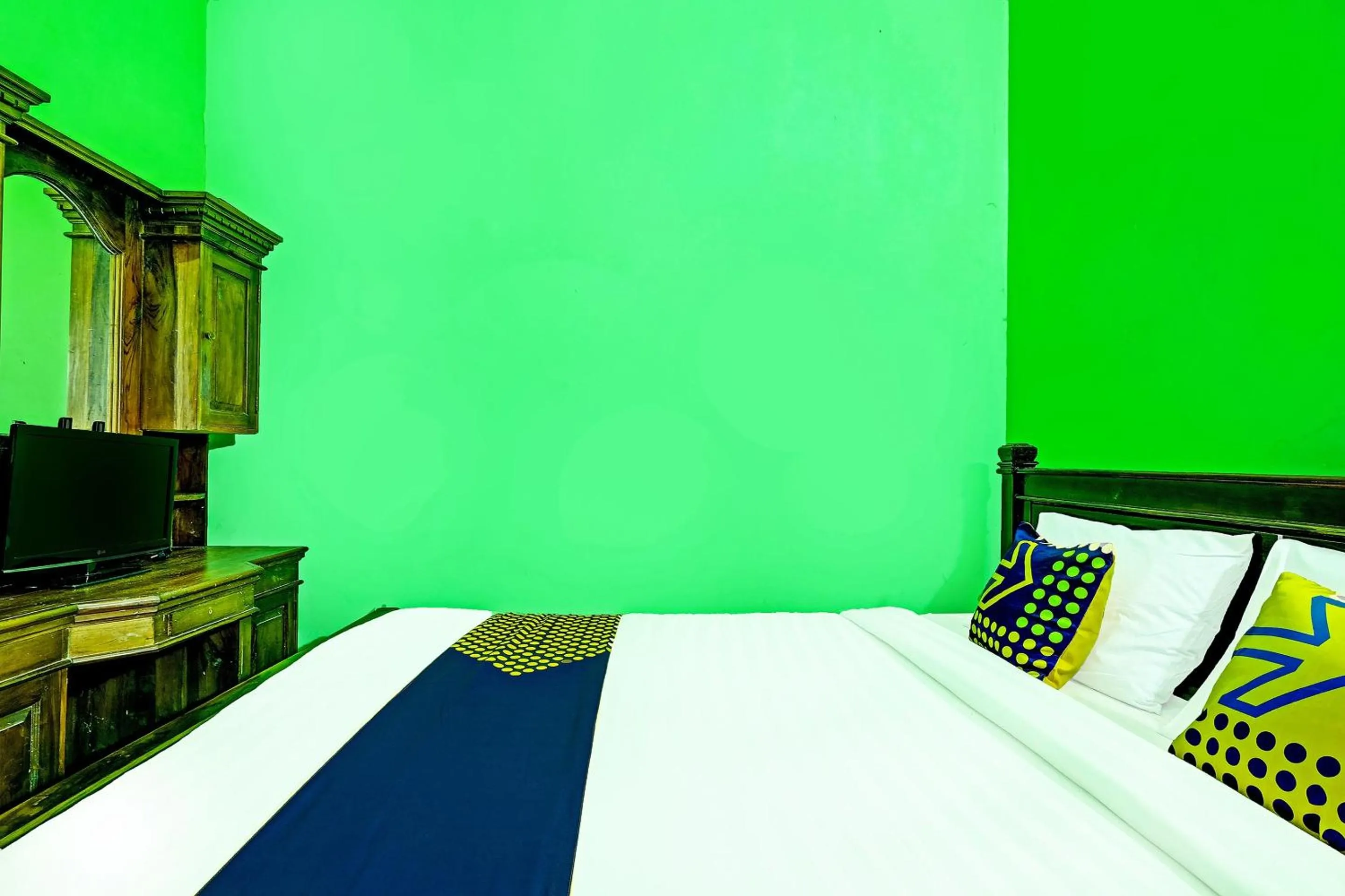 Bedroom in OYO Homes 91095 Desa Wisata Conto