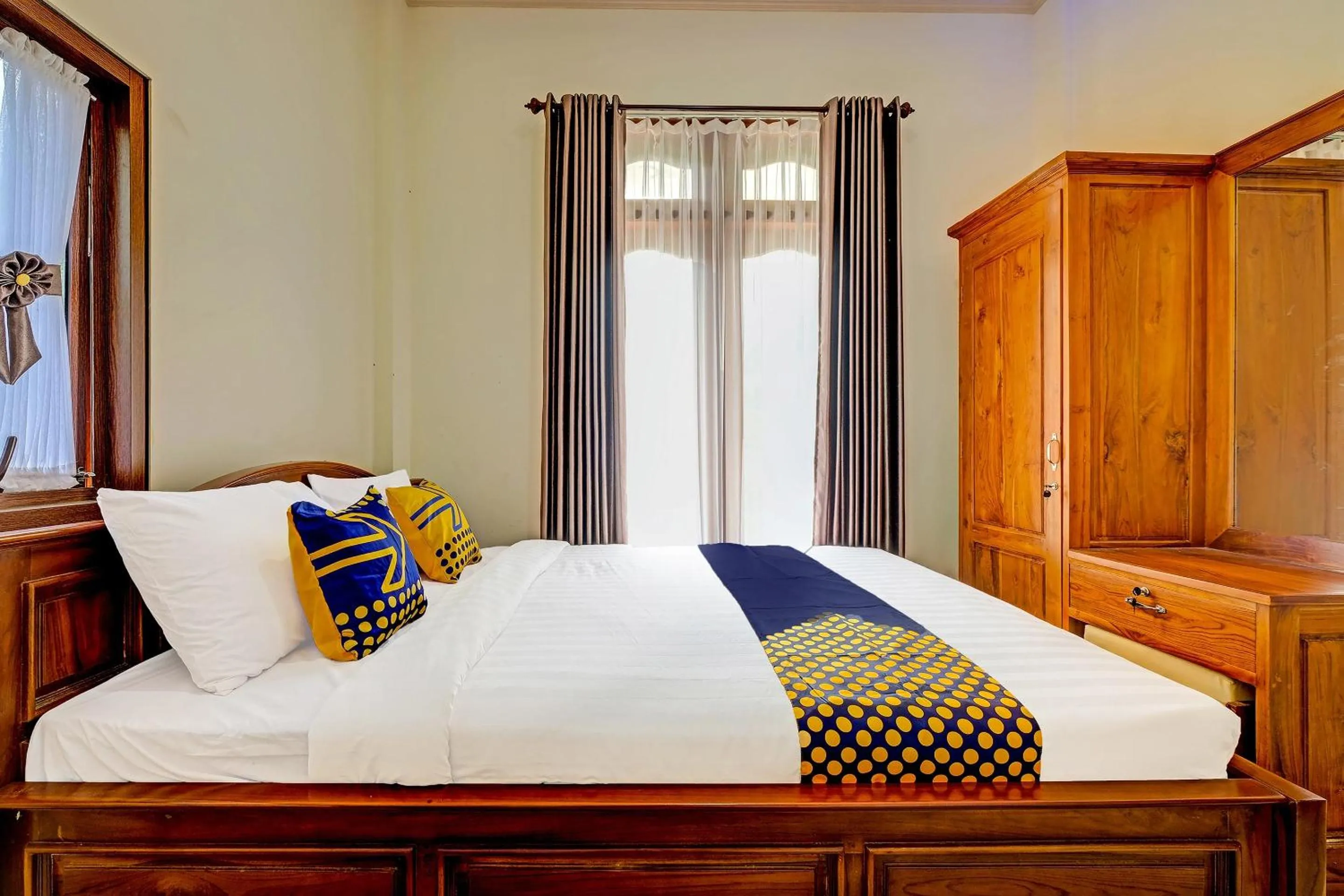 Bedroom in OYO Homes 91095 Desa Wisata Conto