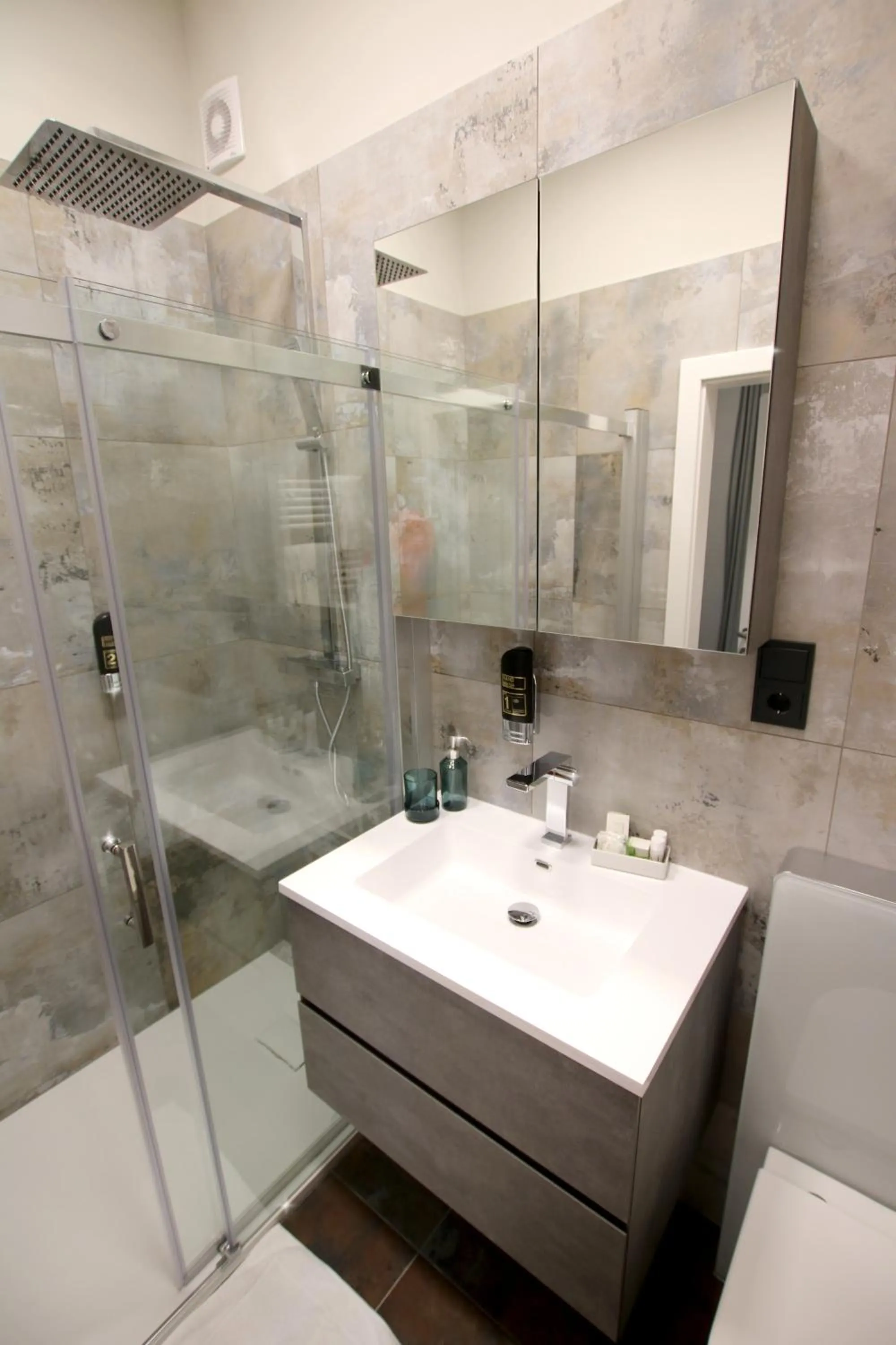 Shower in Street Living Hotel - Apartments