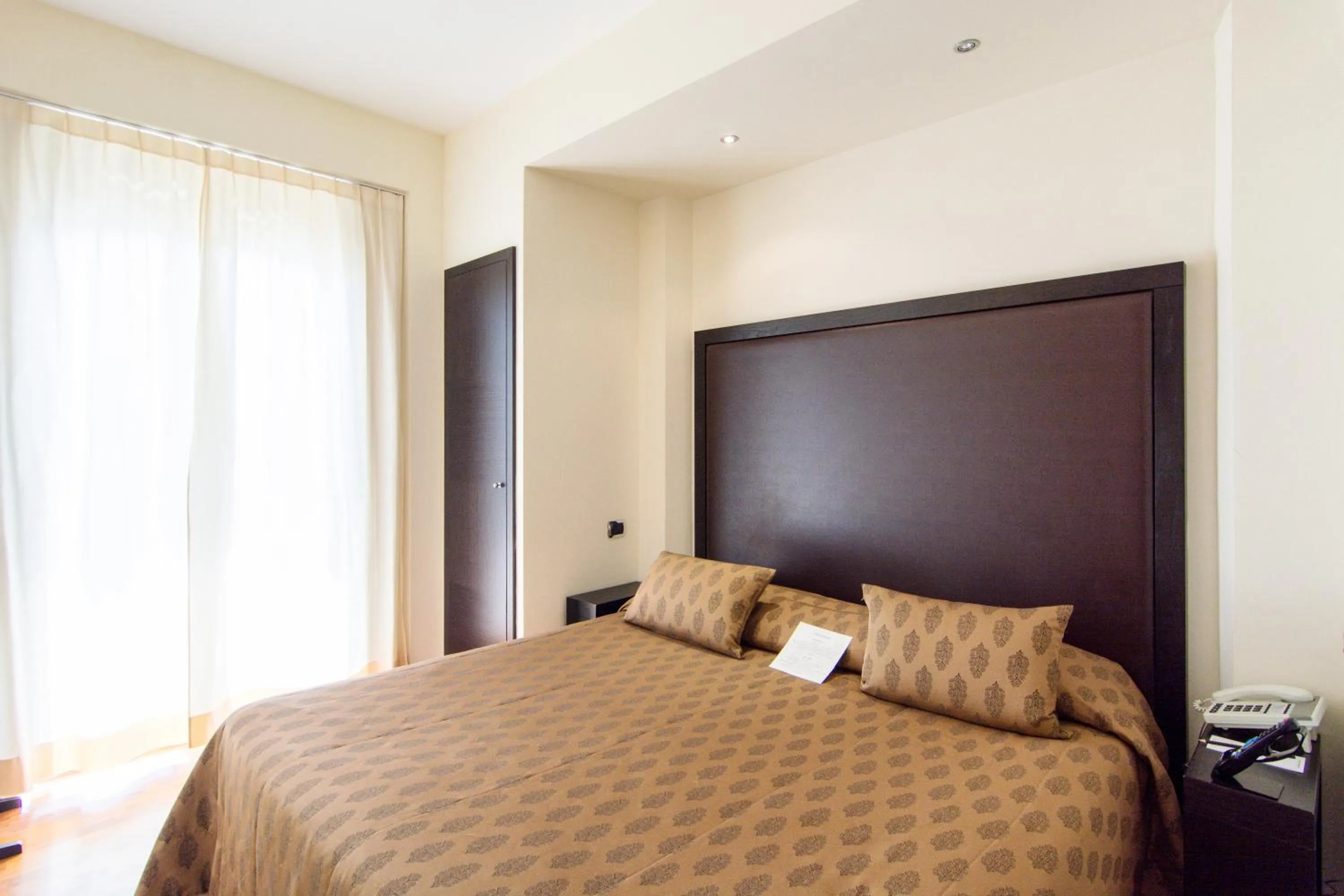 Bed in Terrazza Marconi Hotel&Spamarine