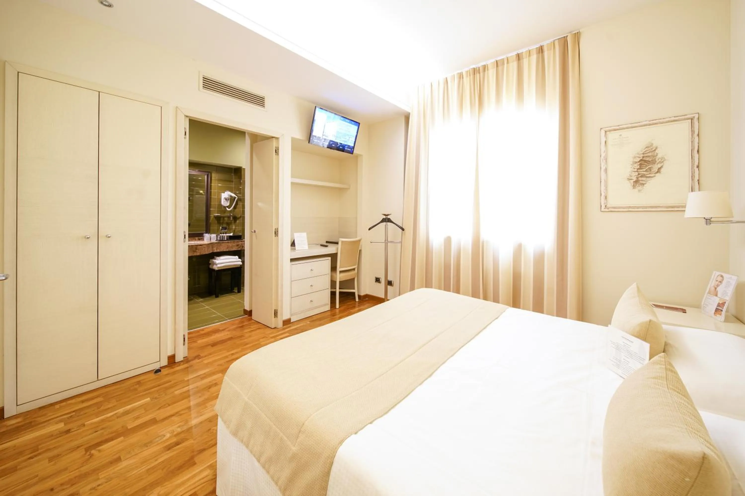 Bed in Terrazza Marconi Hotel&Spamarine