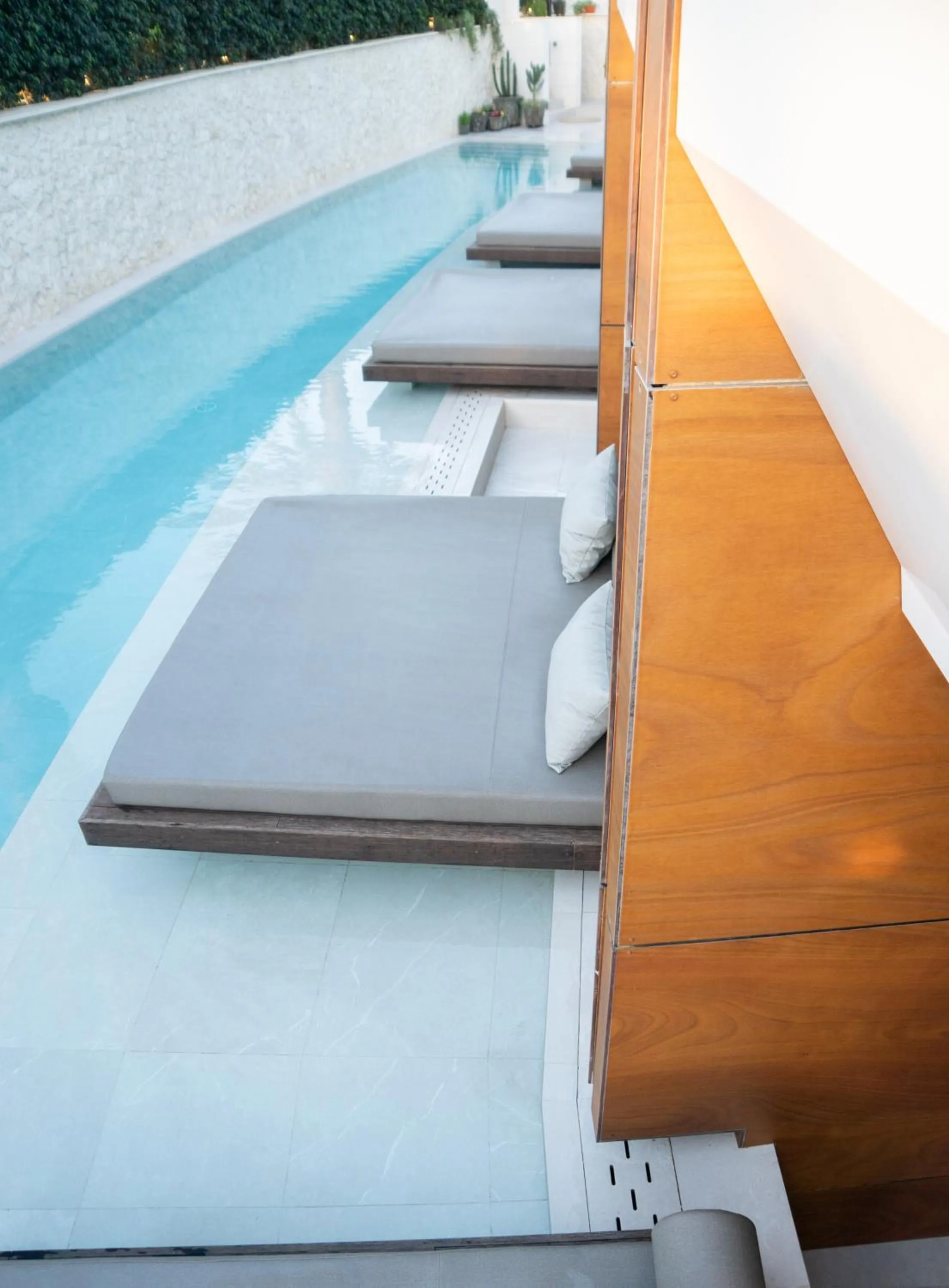 Swimming pool in TenSuites - Adults Only