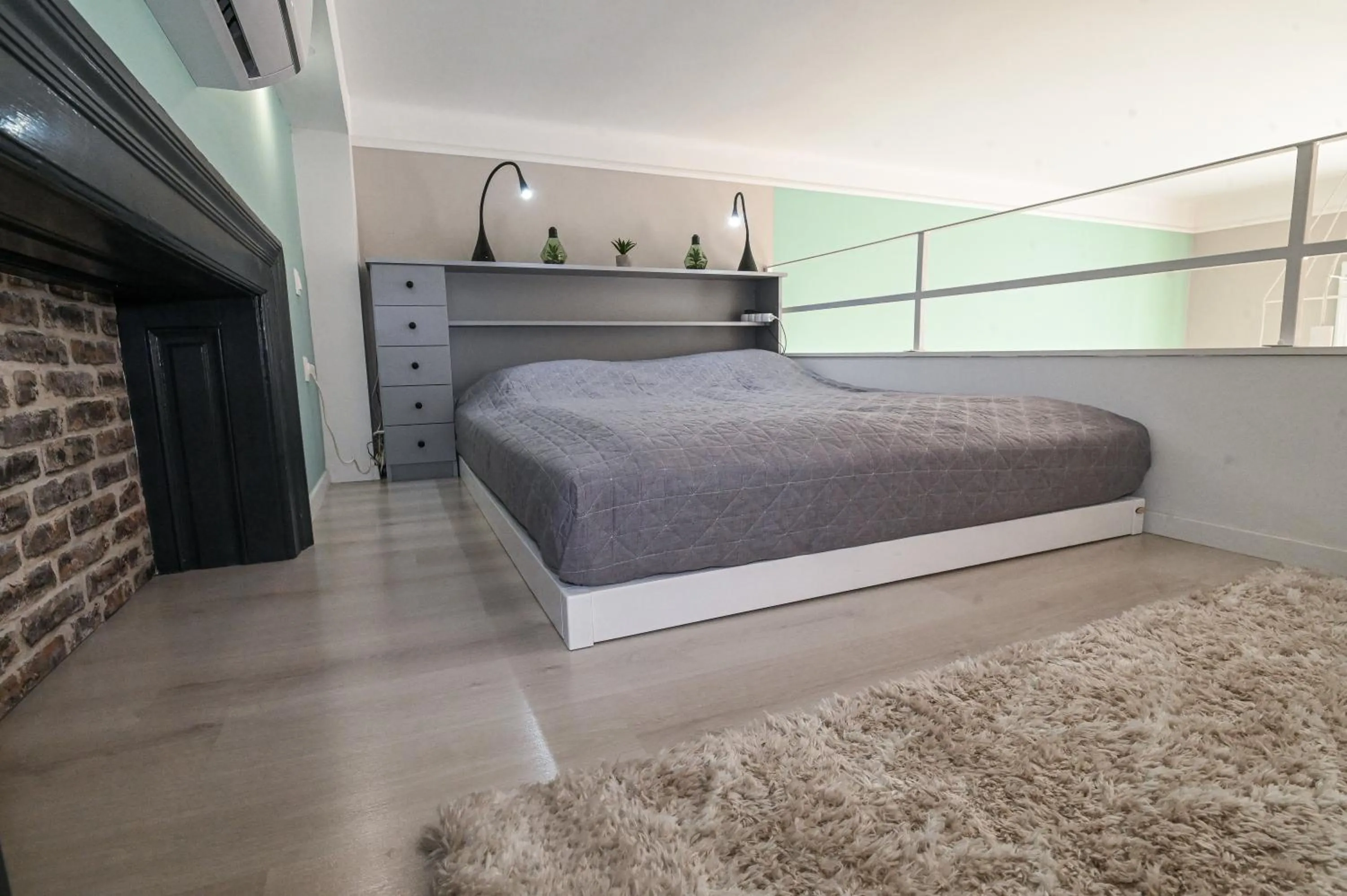 Bed in Palms Apartments Budapest