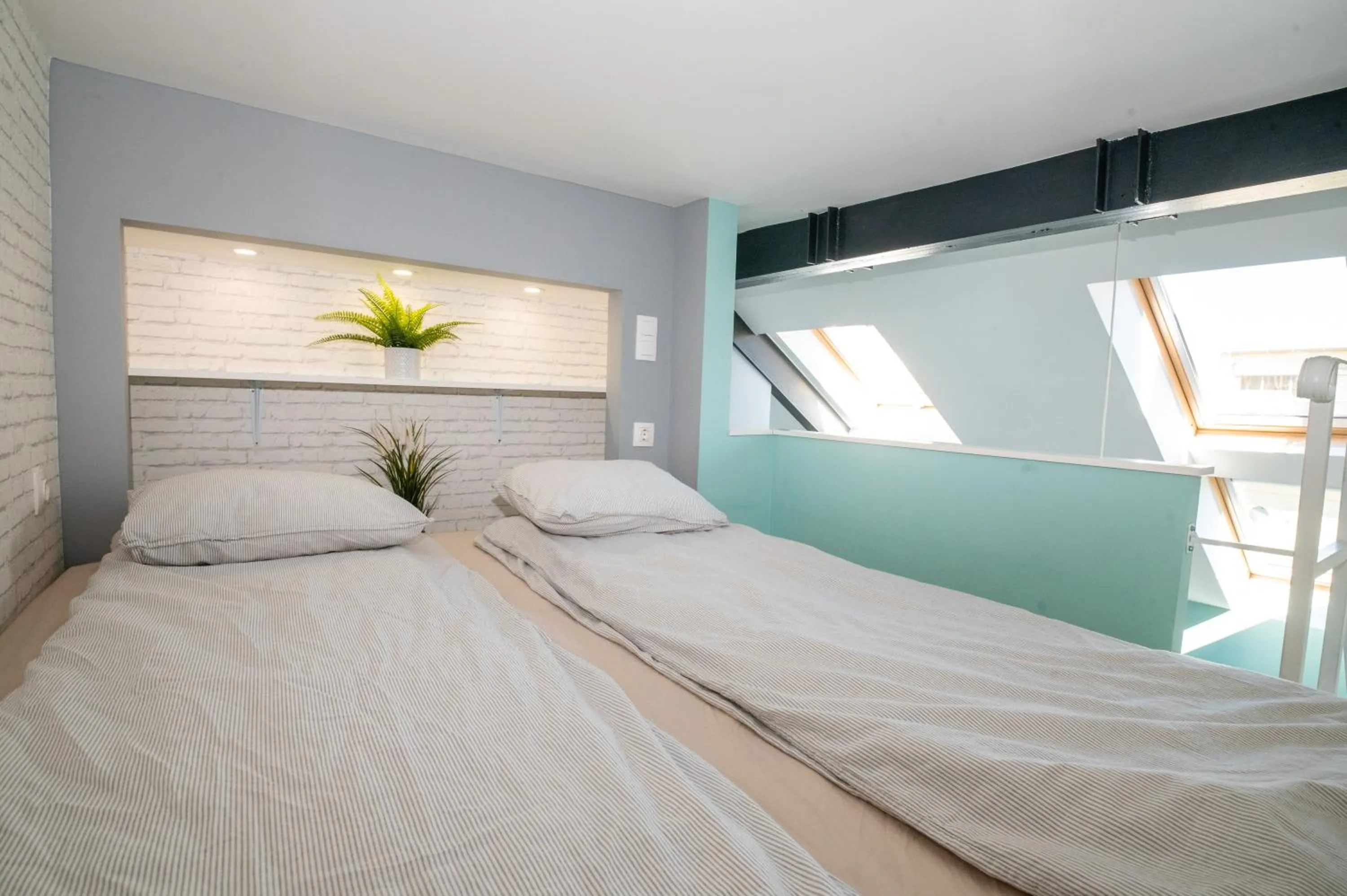 Bed in Palms Apartments Budapest