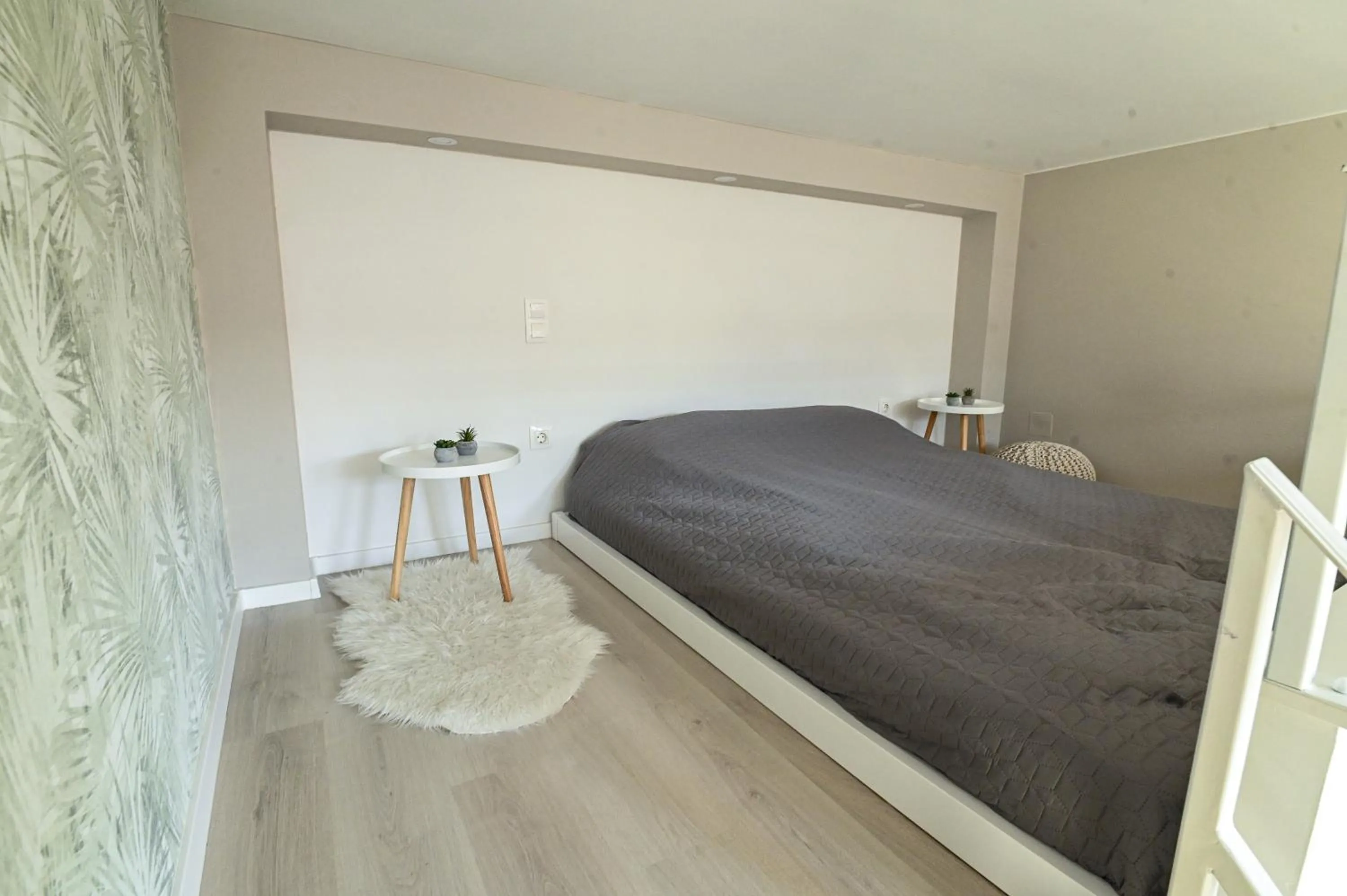 Bed in Palms Apartments Budapest