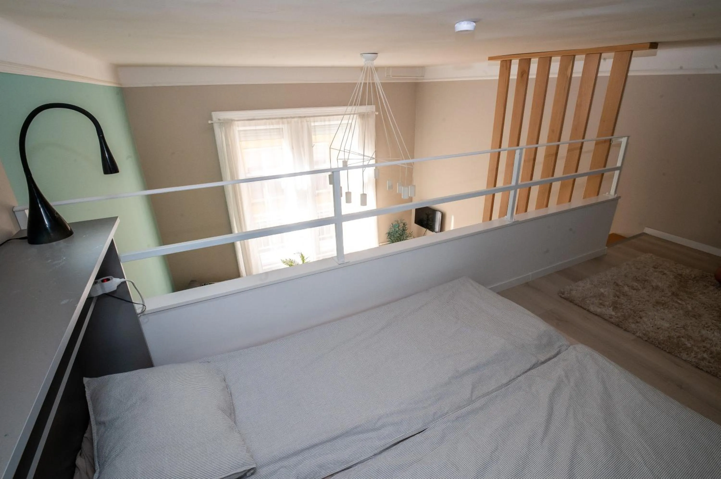 Bed in Palms Apartments Budapest