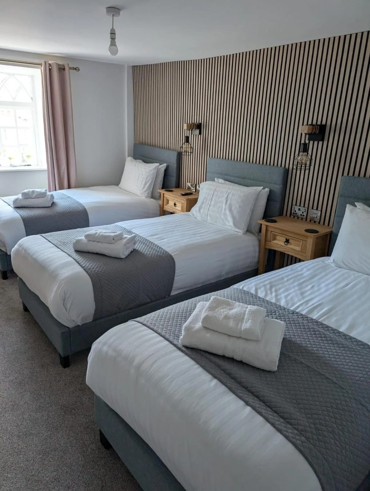 Bed in Prince Llewelyn Hotel