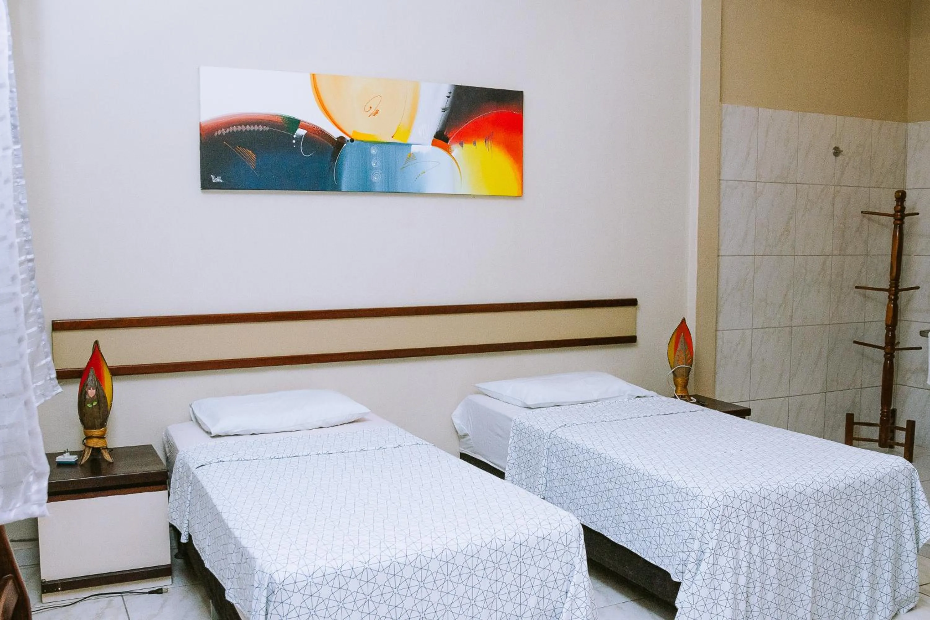 Bed in Pousada Casarão 2030